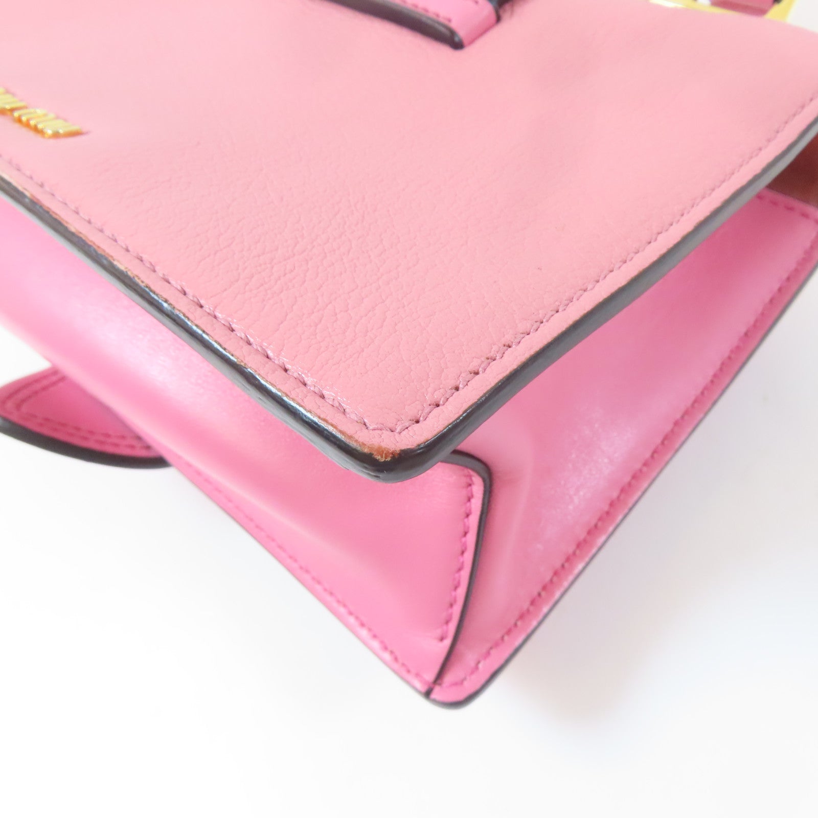 Miu Miu 牛皮皮革金扣肩背袋粉紅色
