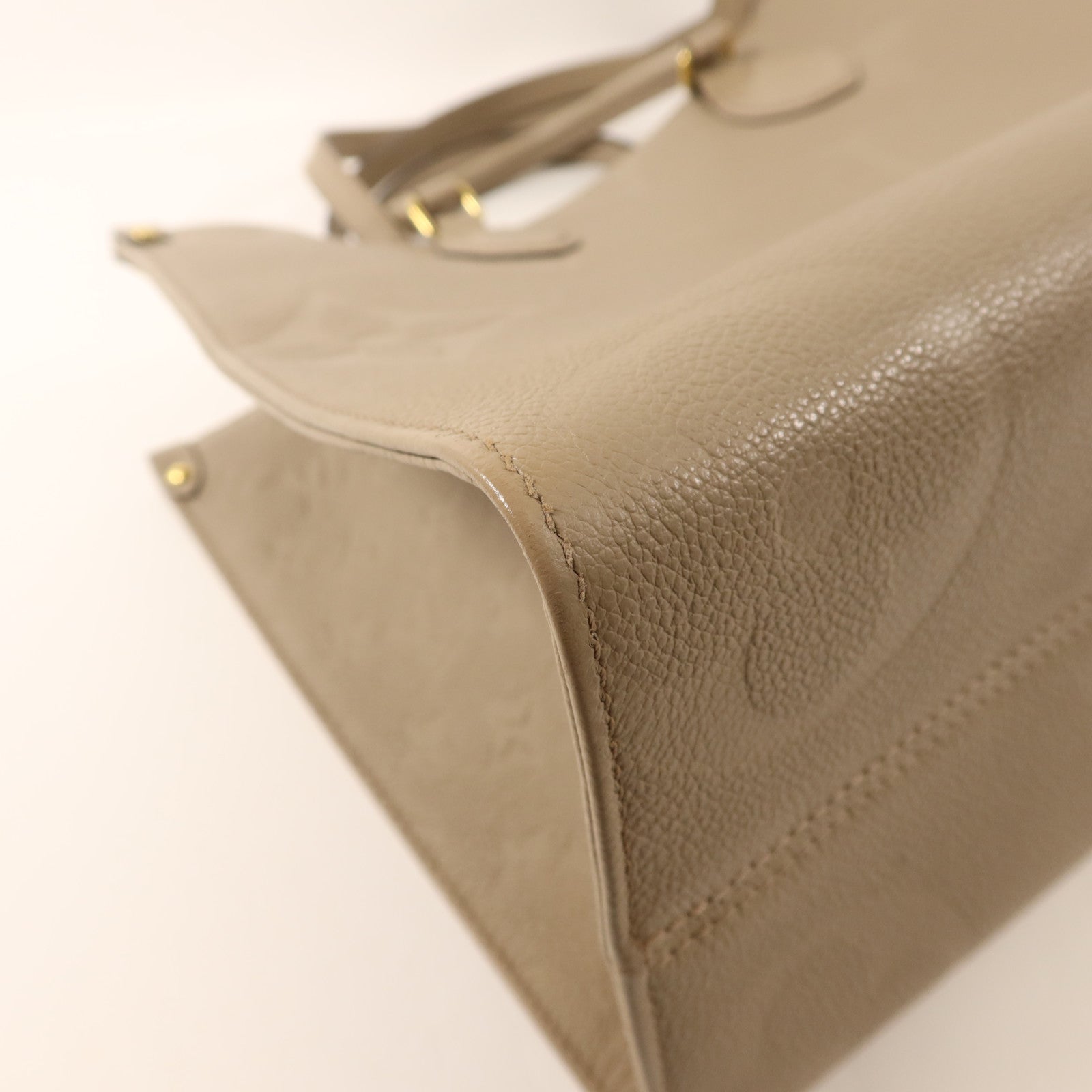 LOUIS VUITTON Monogram Empreinte On The Go MM金扣手挽肩背兩用袋