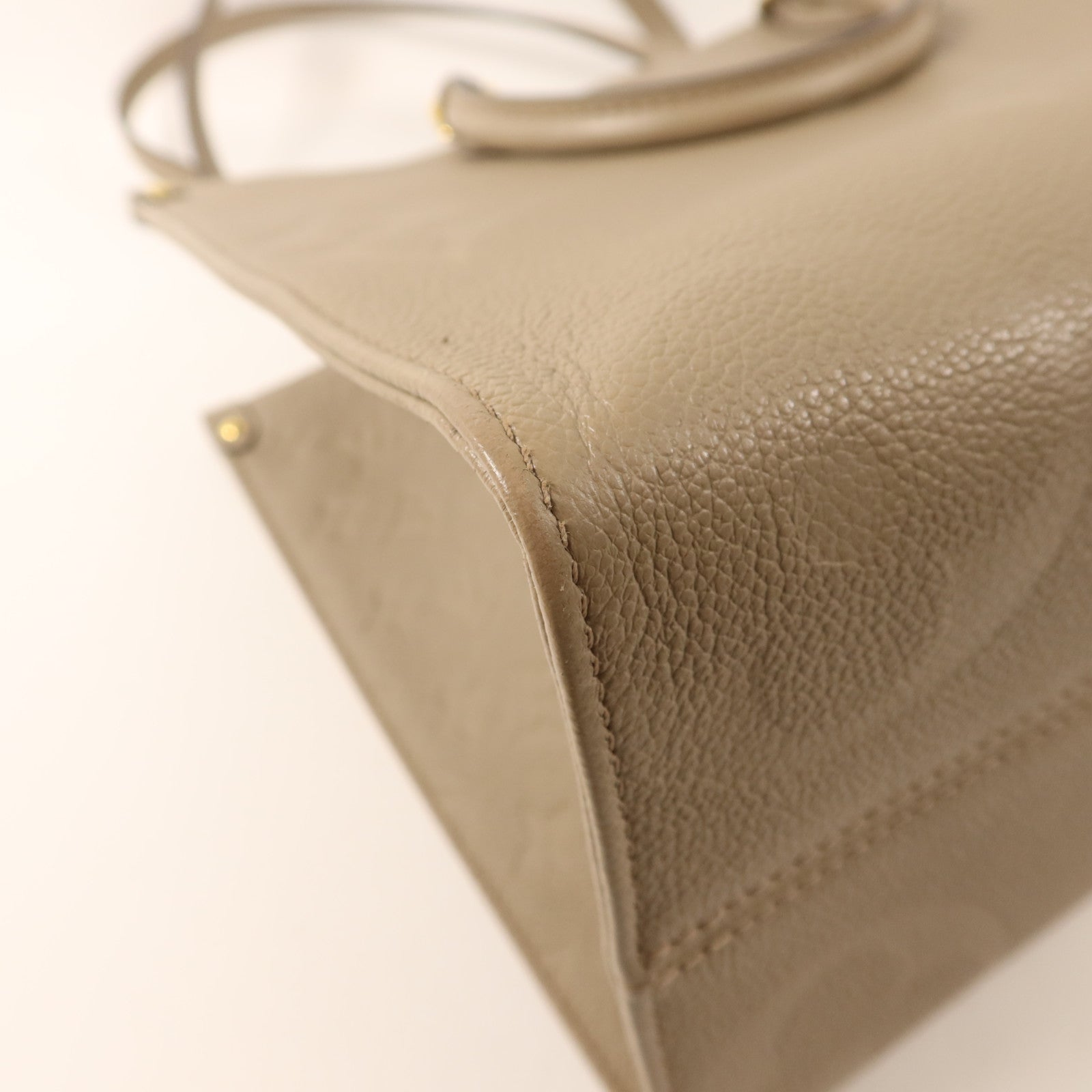 LOUIS VUITTON Monogram Empreinte On The Go MM金扣手挽肩背兩用袋