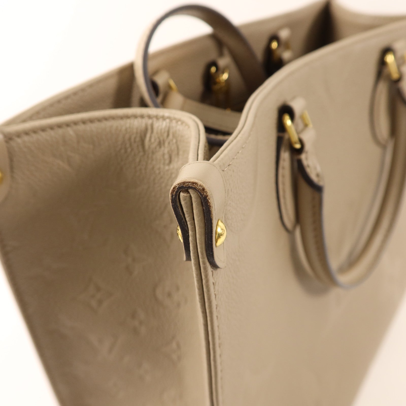 LOUIS VUITTON Monogram Empreinte On The Go MM金扣手挽肩背兩用袋