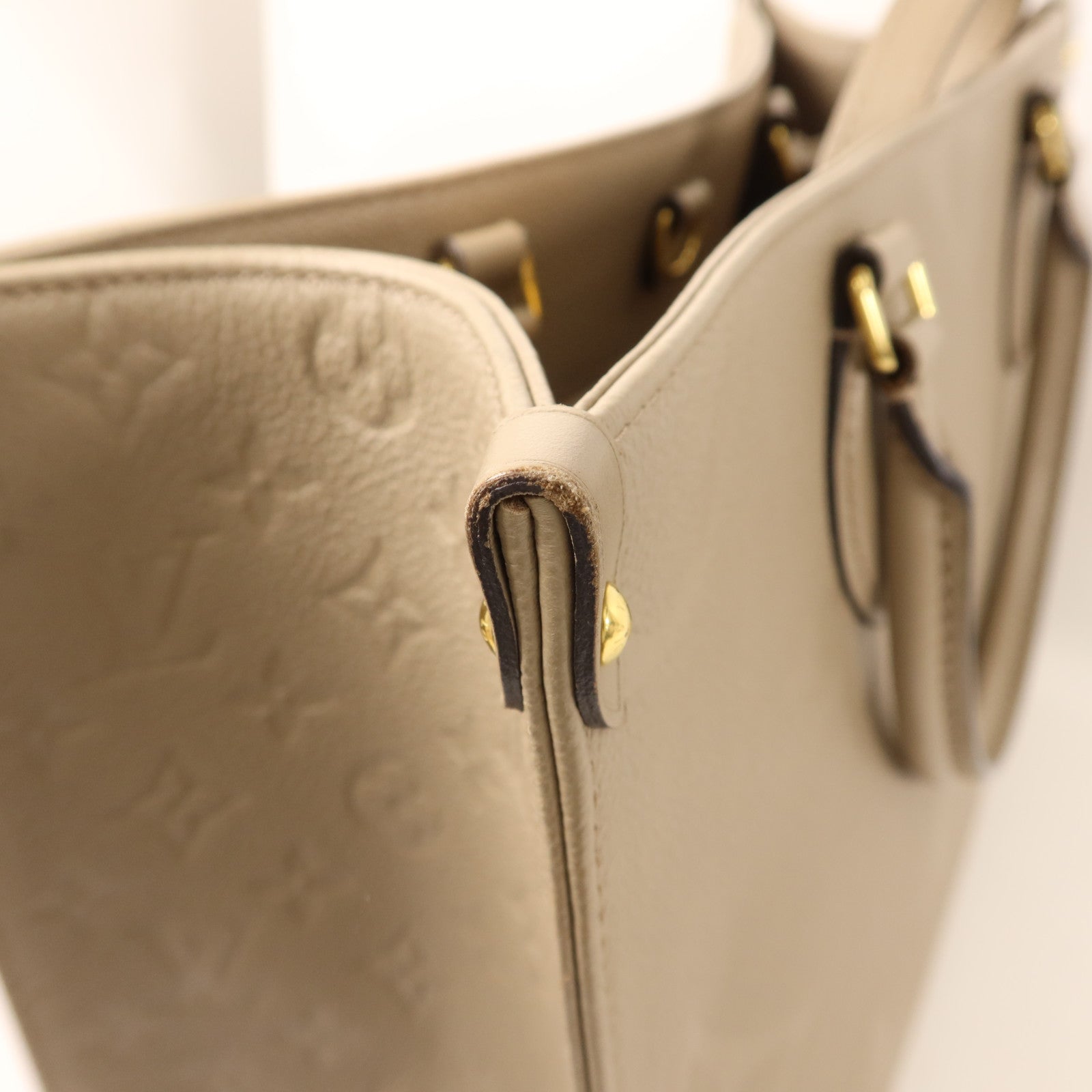 LOUIS VUITTON Monogram Empreinte On The Go MM金扣手挽肩背兩用袋