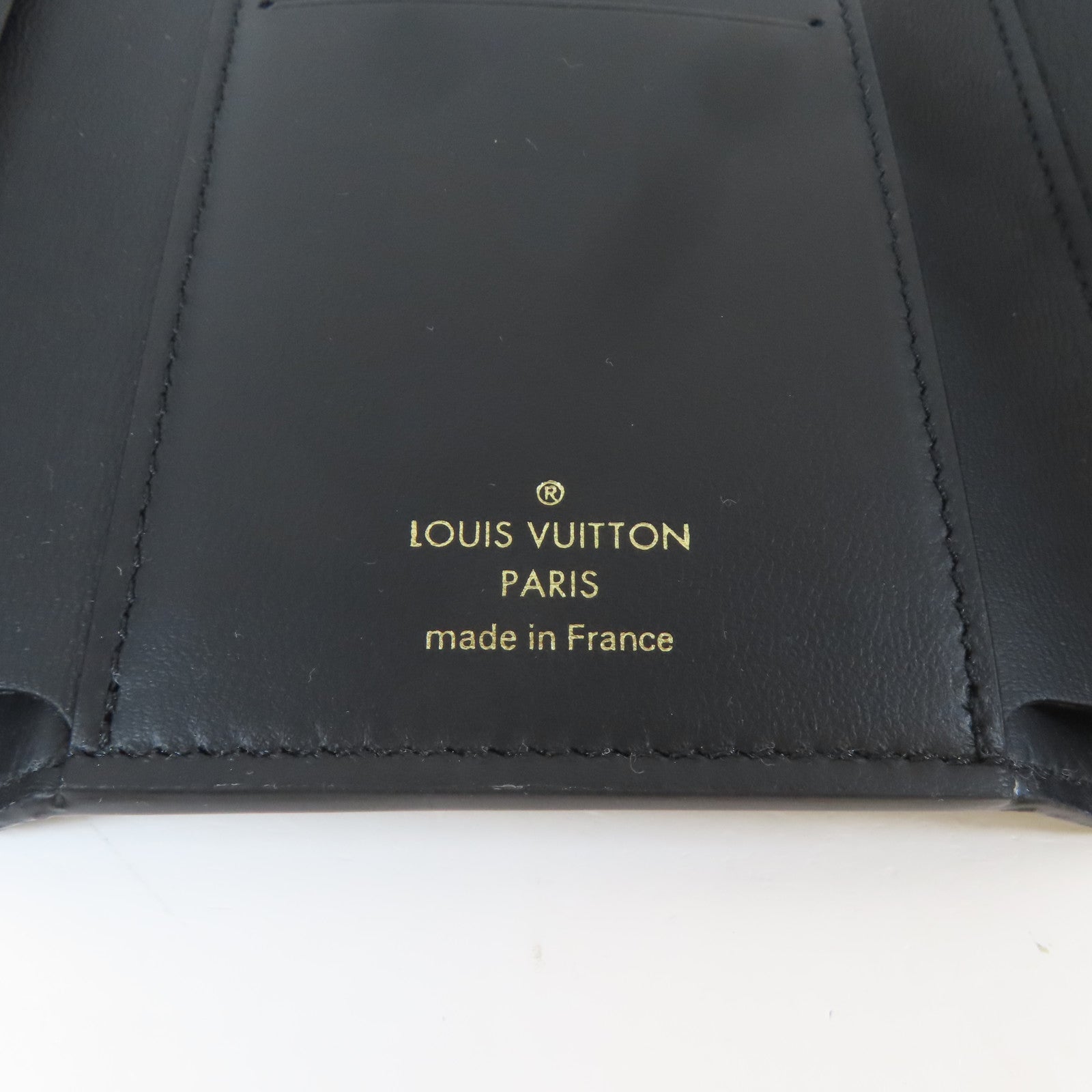 LOUIS VUITTON 牛皮皮革Trifold Wallet金扣錢包黑色