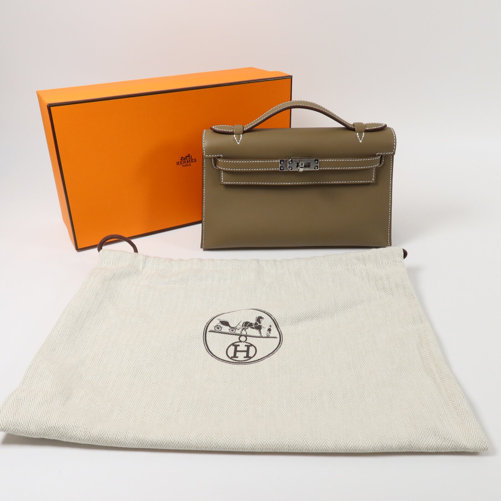 HERMES Swift皮革Kelly Pochette手挽袋Etoupe