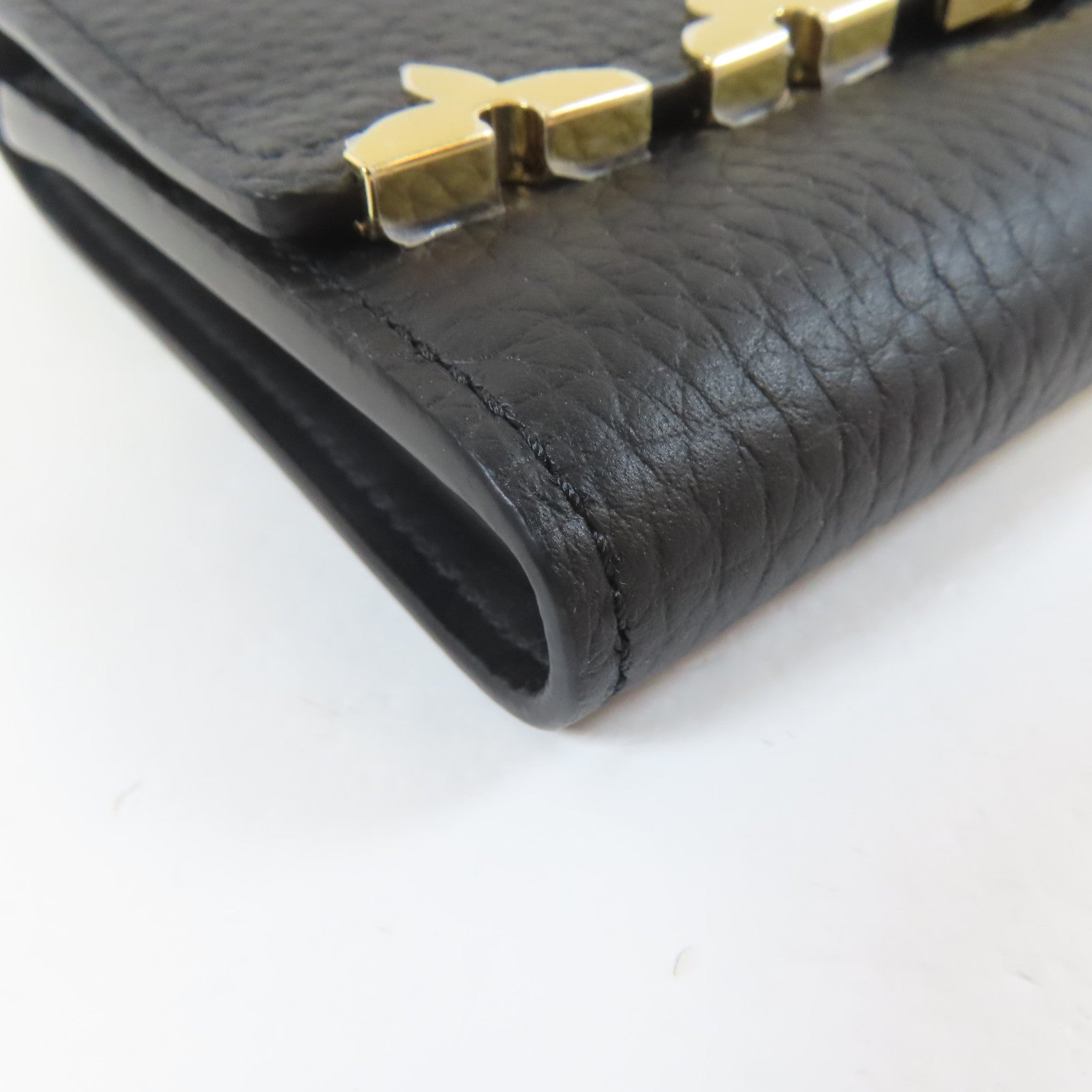 LOUIS VUITTON 牛皮皮革Trifold Wallet金扣錢包黑色