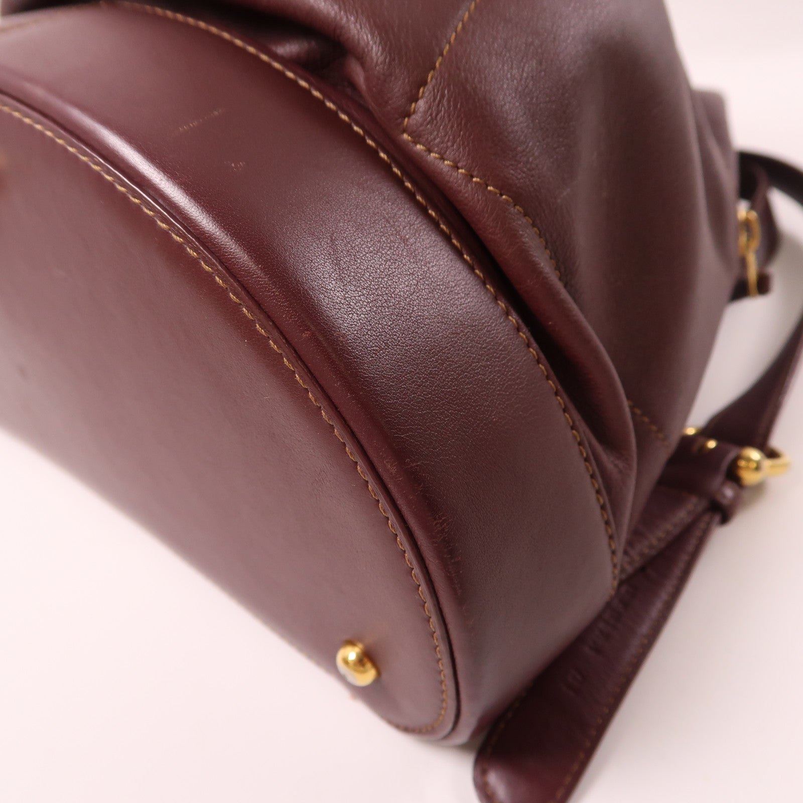 LOEWE 牛皮皮革Backpack金扣背包酒紅色