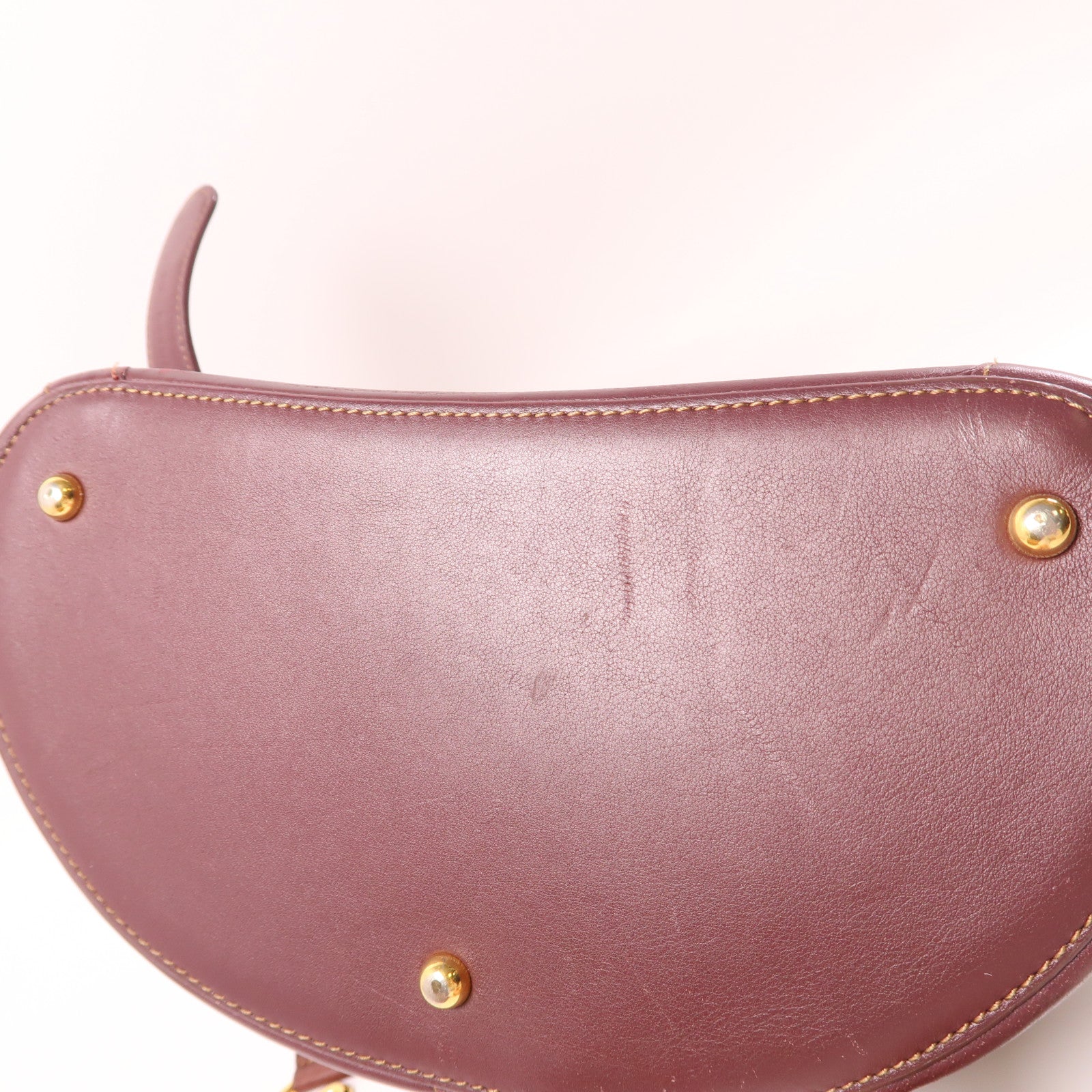 LOEWE 牛皮皮革Backpack金扣背包酒紅色