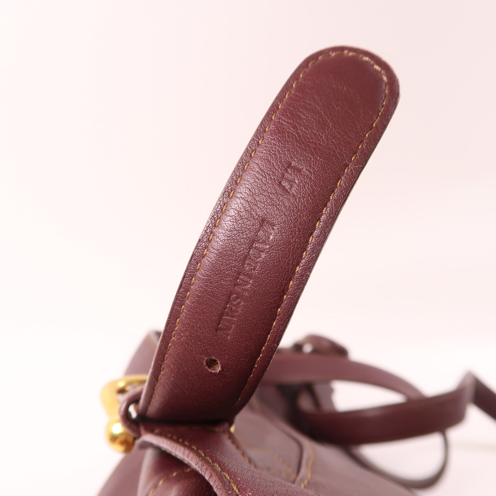 LOEWE 牛皮皮革Backpack金扣背包酒紅色