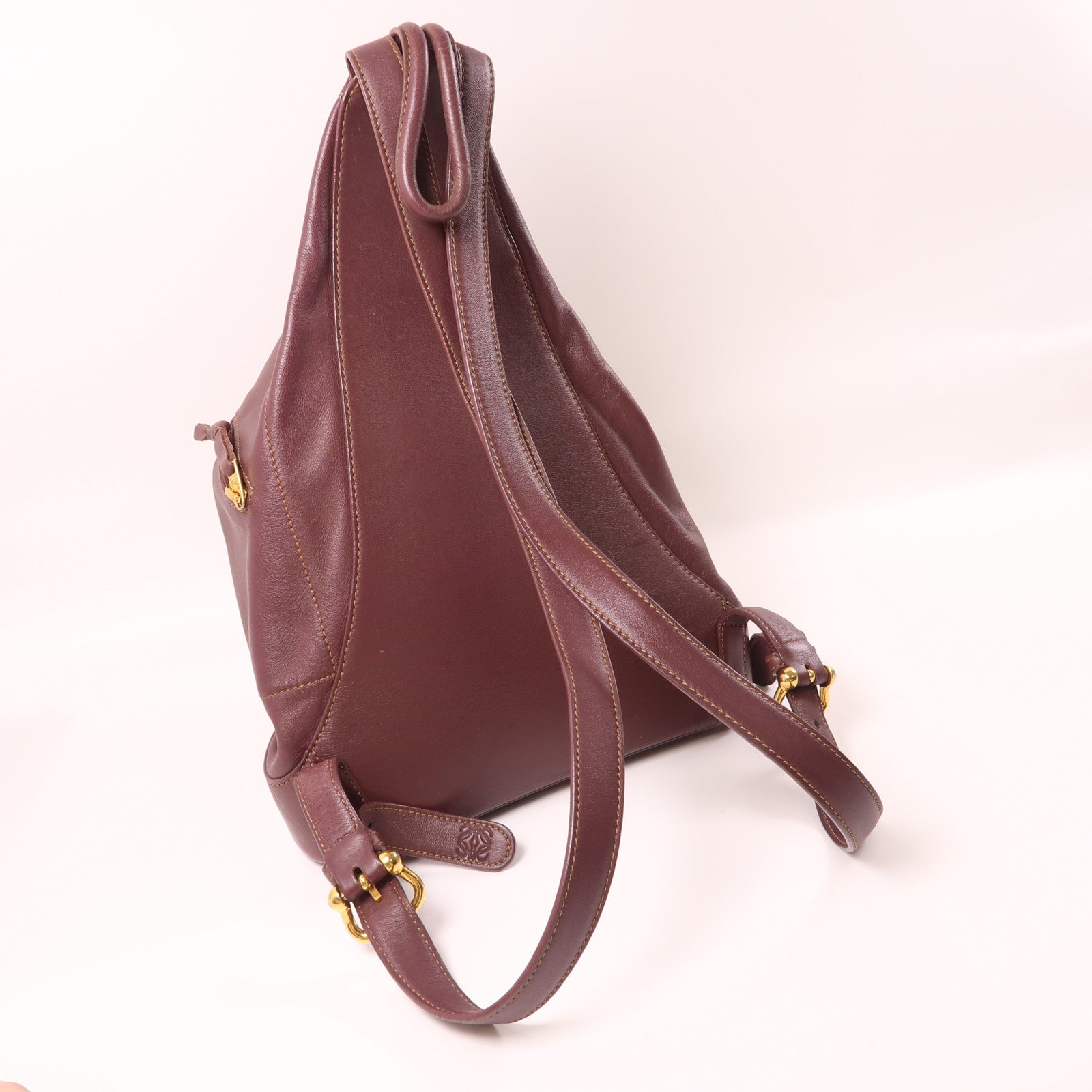 LOEWE 牛皮皮革Backpack金扣背包酒紅色