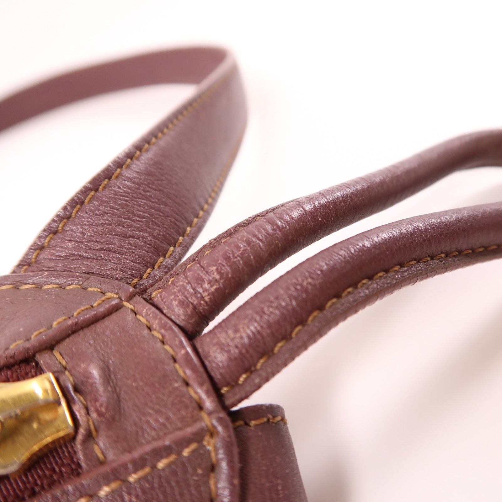 LOEWE 牛皮皮革Backpack金扣背包酒紅色