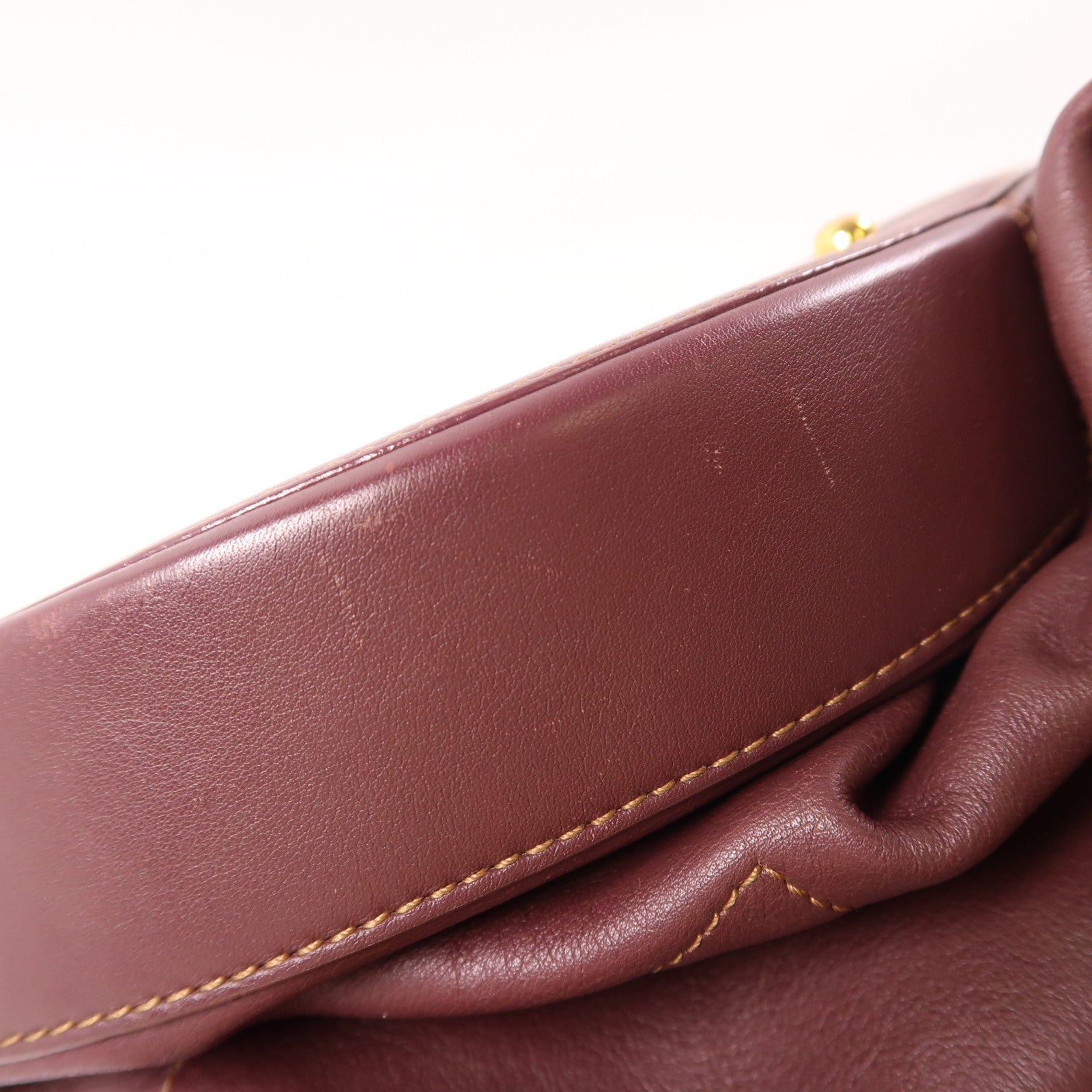 LOEWE 牛皮皮革Backpack金扣背包酒紅色