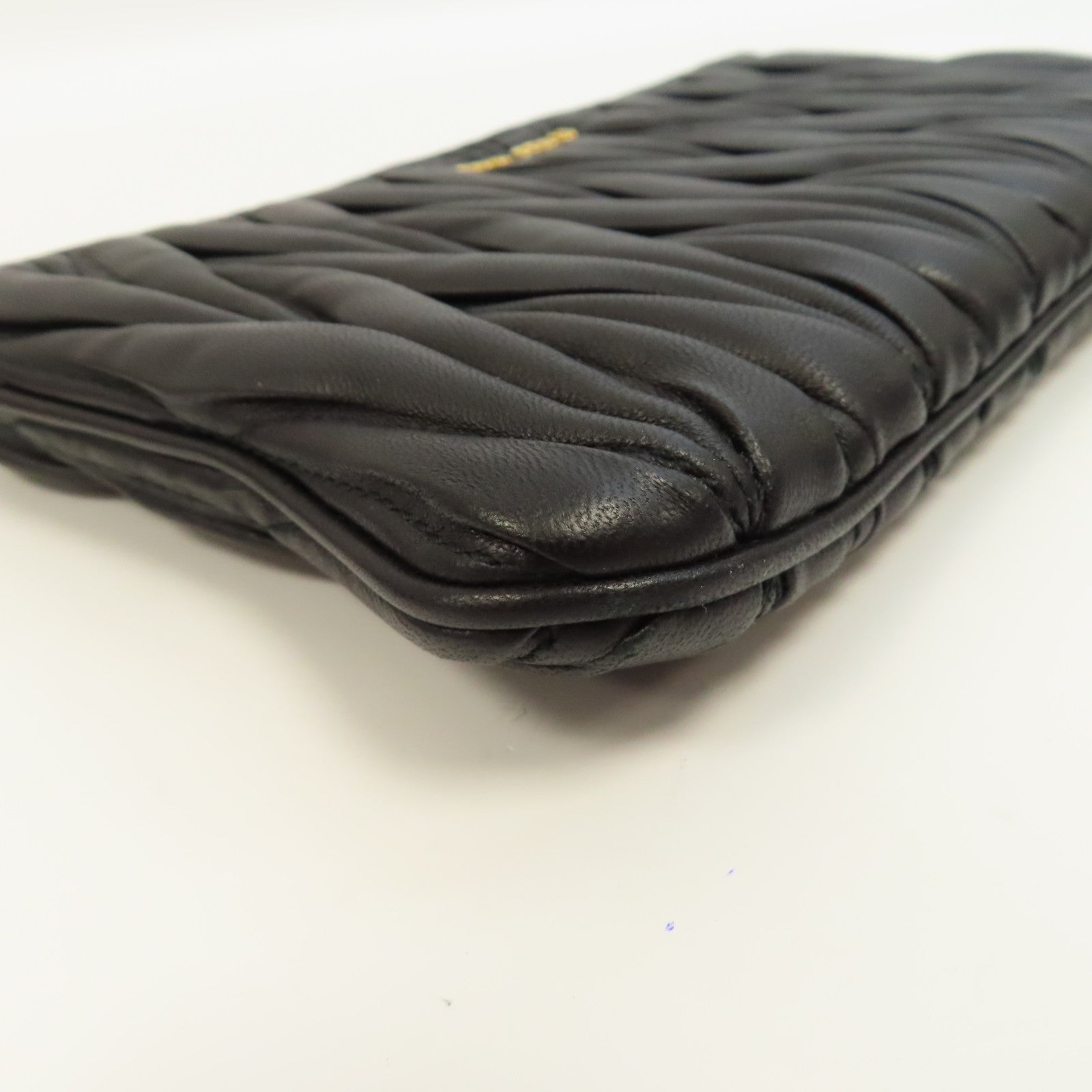 Miu Miu 羊皮皮革Clutch Bag金扣手拿包黑色