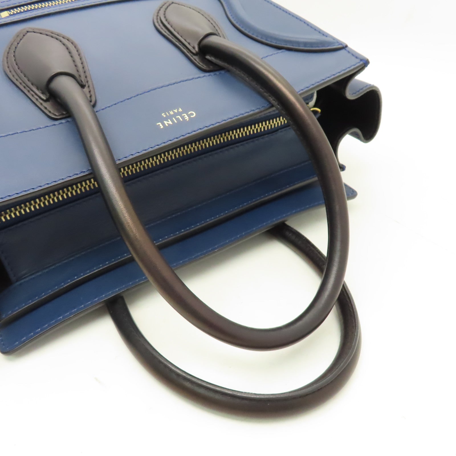 CELINE 【清倉大減價】牛皮皮革Micro Luggage金扣手挽袋藍色/黑色