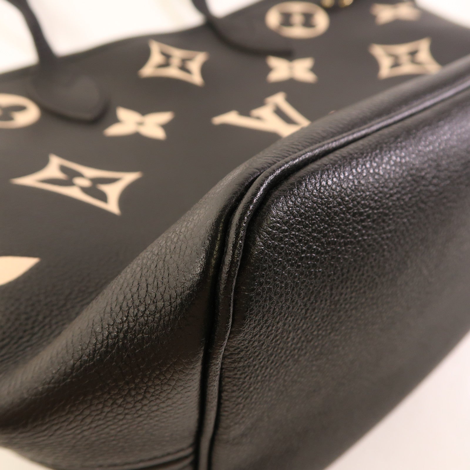 LOUIS VUITTON Monogram Empreinte Neverfull MM金扣手挽袋