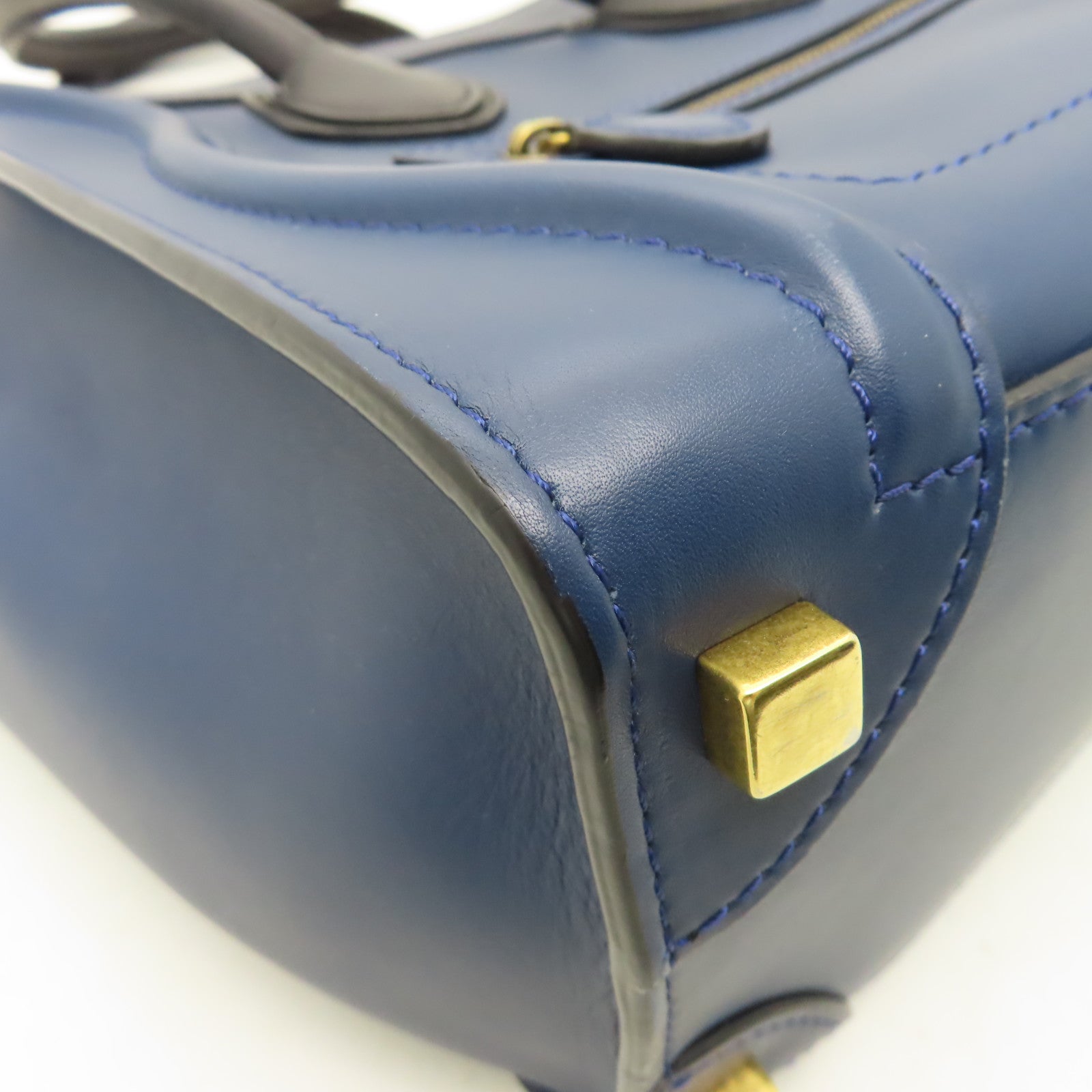 CELINE 【清倉大減價】牛皮皮革Micro Luggage金扣手挽袋藍色/黑色