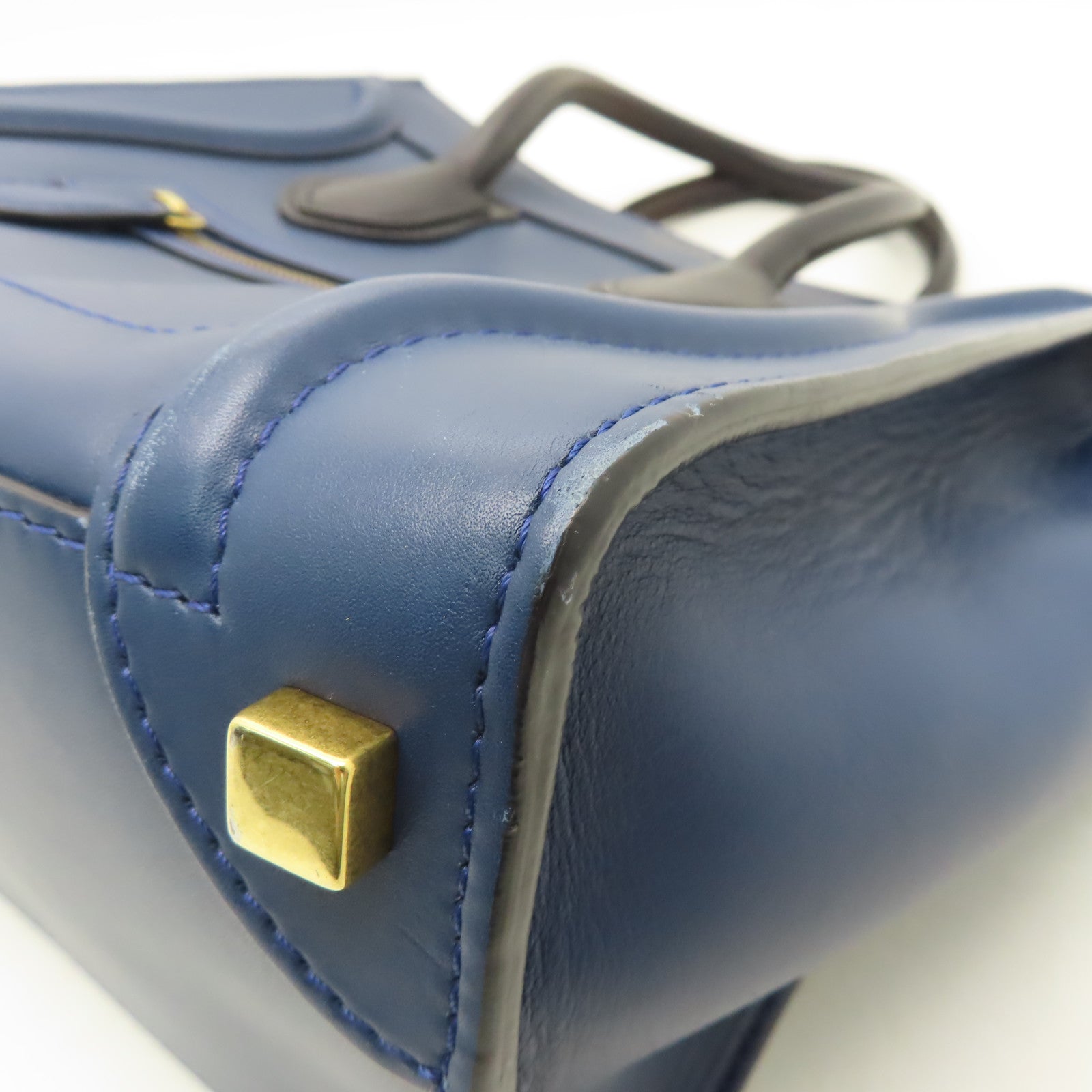 CELINE 【清倉大減價】牛皮皮革Micro Luggage金扣手挽袋藍色/黑色