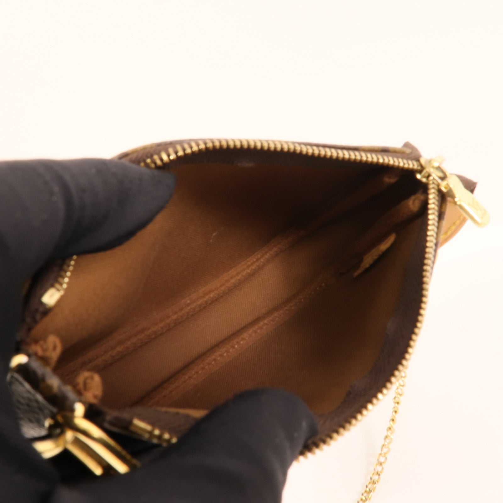 LOUIS VUITTON Monogram Mini Pochette Accessoires金扣手挽袋