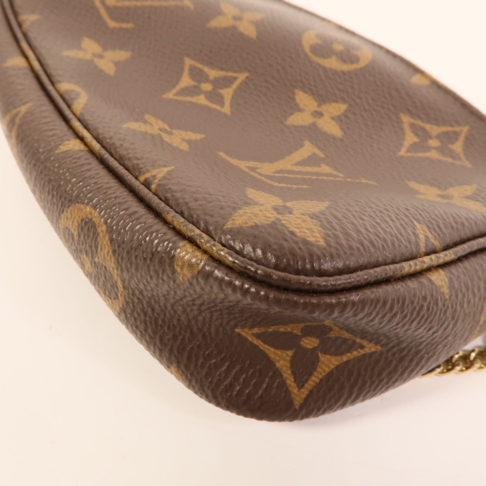 LOUIS VUITTON Monogram Mini Pochette Accessoires金扣手挽袋