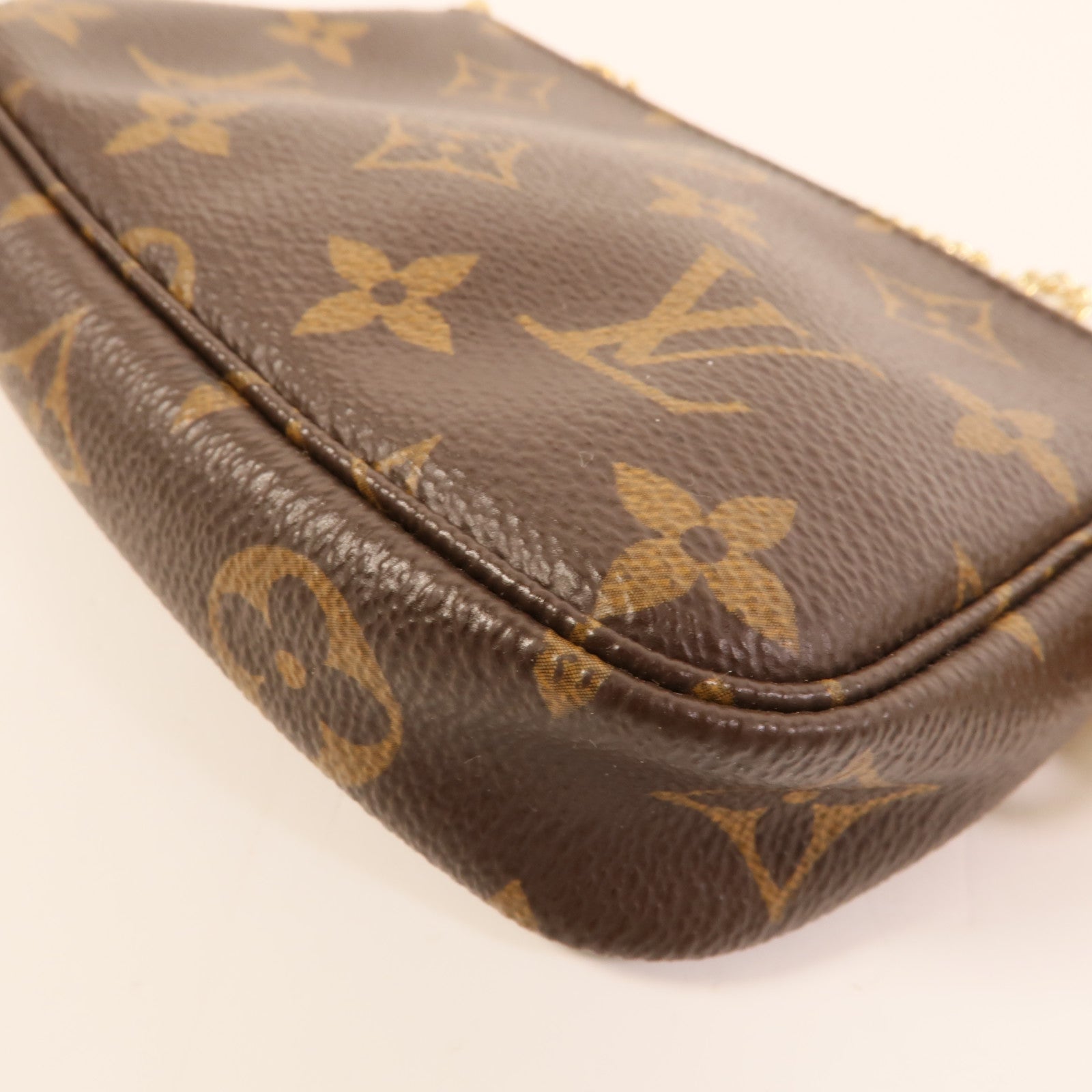LOUIS VUITTON Monogram Mini Pochette Accessoires金扣手挽袋