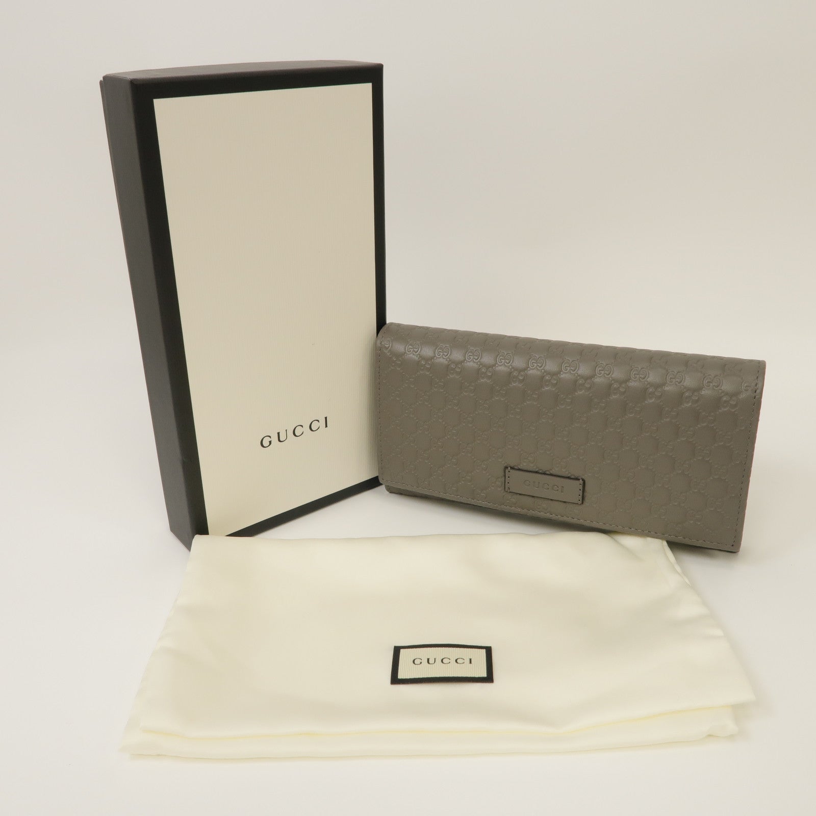 GUCCI 牛皮皮革Micro Guccissima Long Wallet金扣鈕扣長錢包灰色