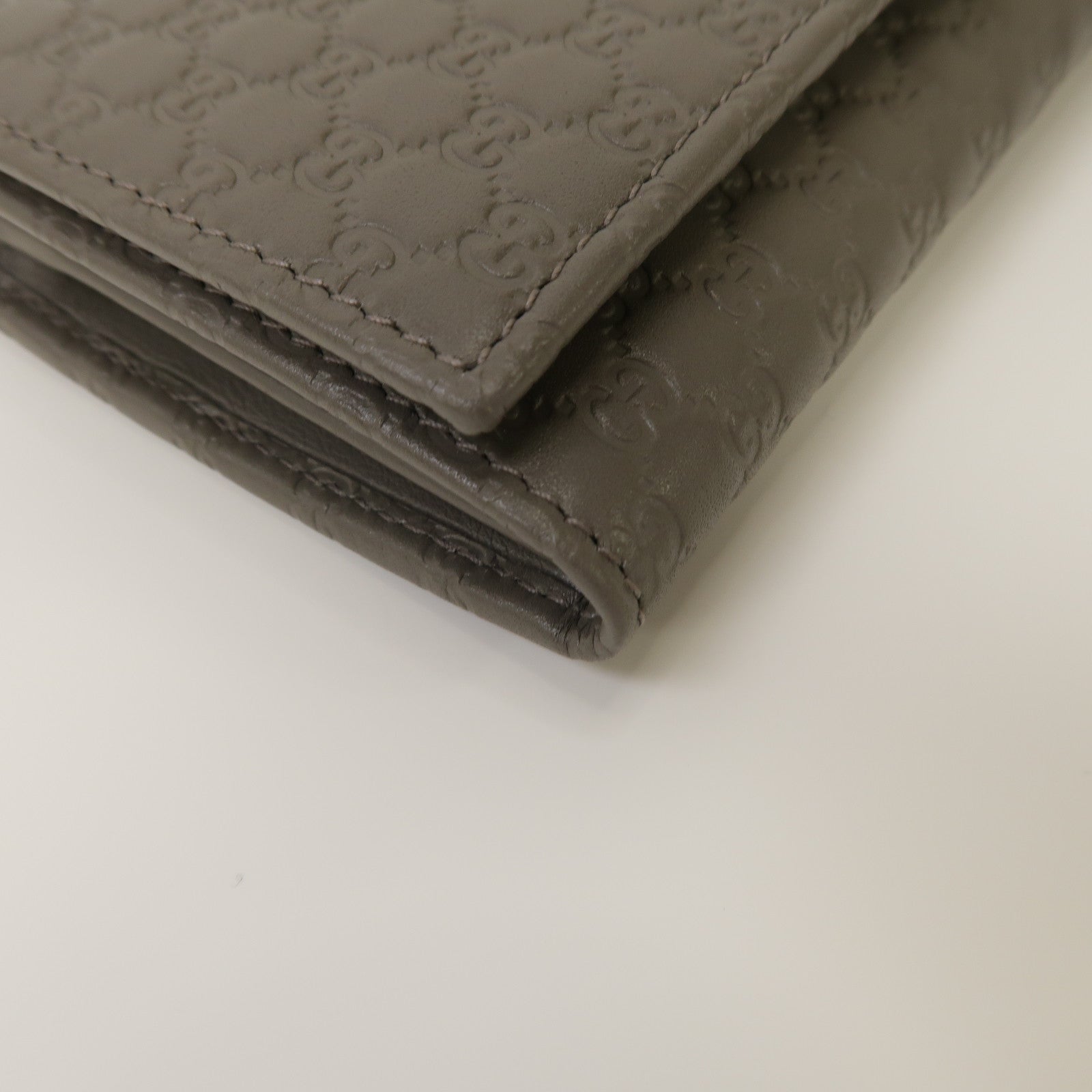 GUCCI 牛皮皮革Micro Guccissima Long Wallet金扣鈕扣長錢包灰色