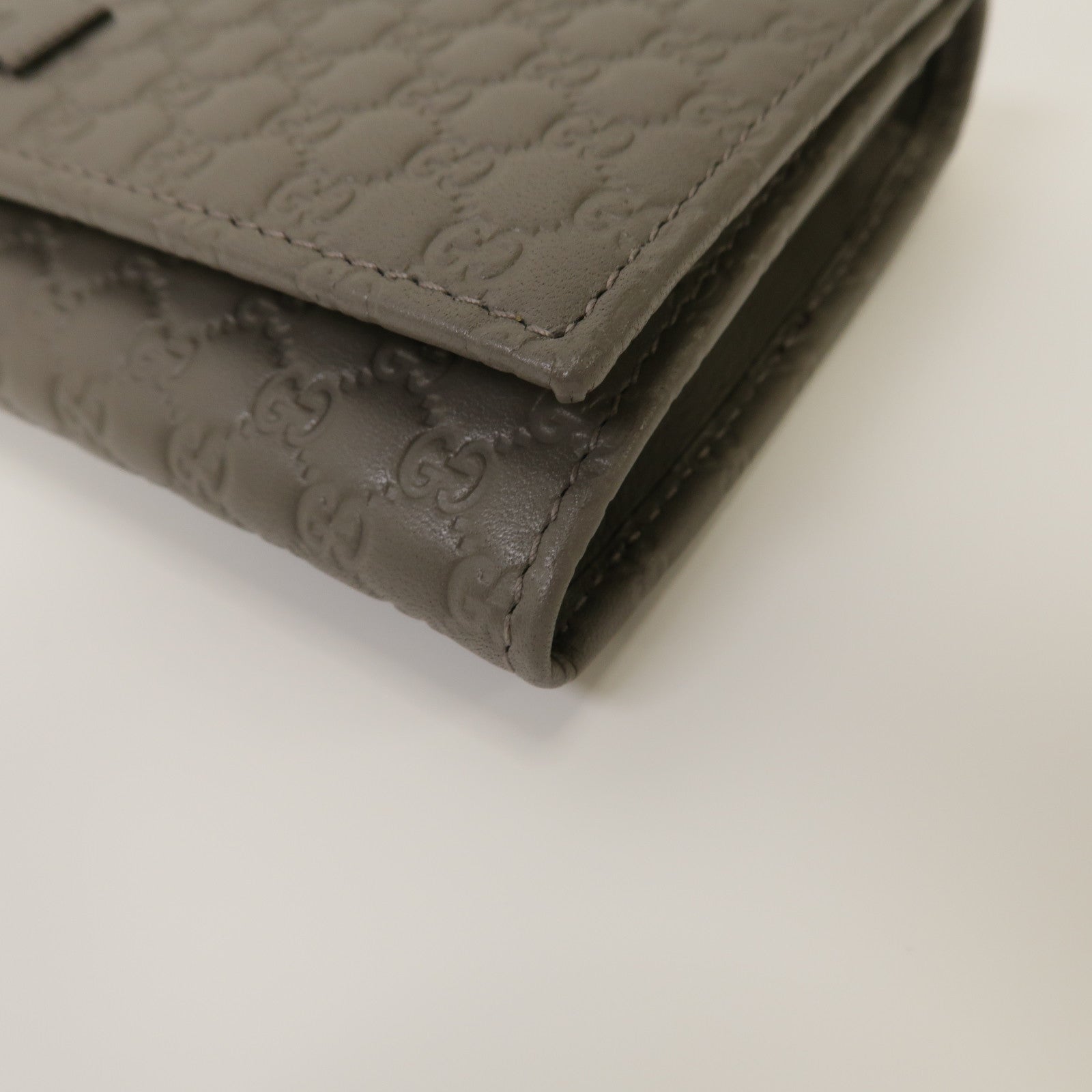 GUCCI 牛皮皮革Micro Guccissima Long Wallet金扣鈕扣長錢包灰色