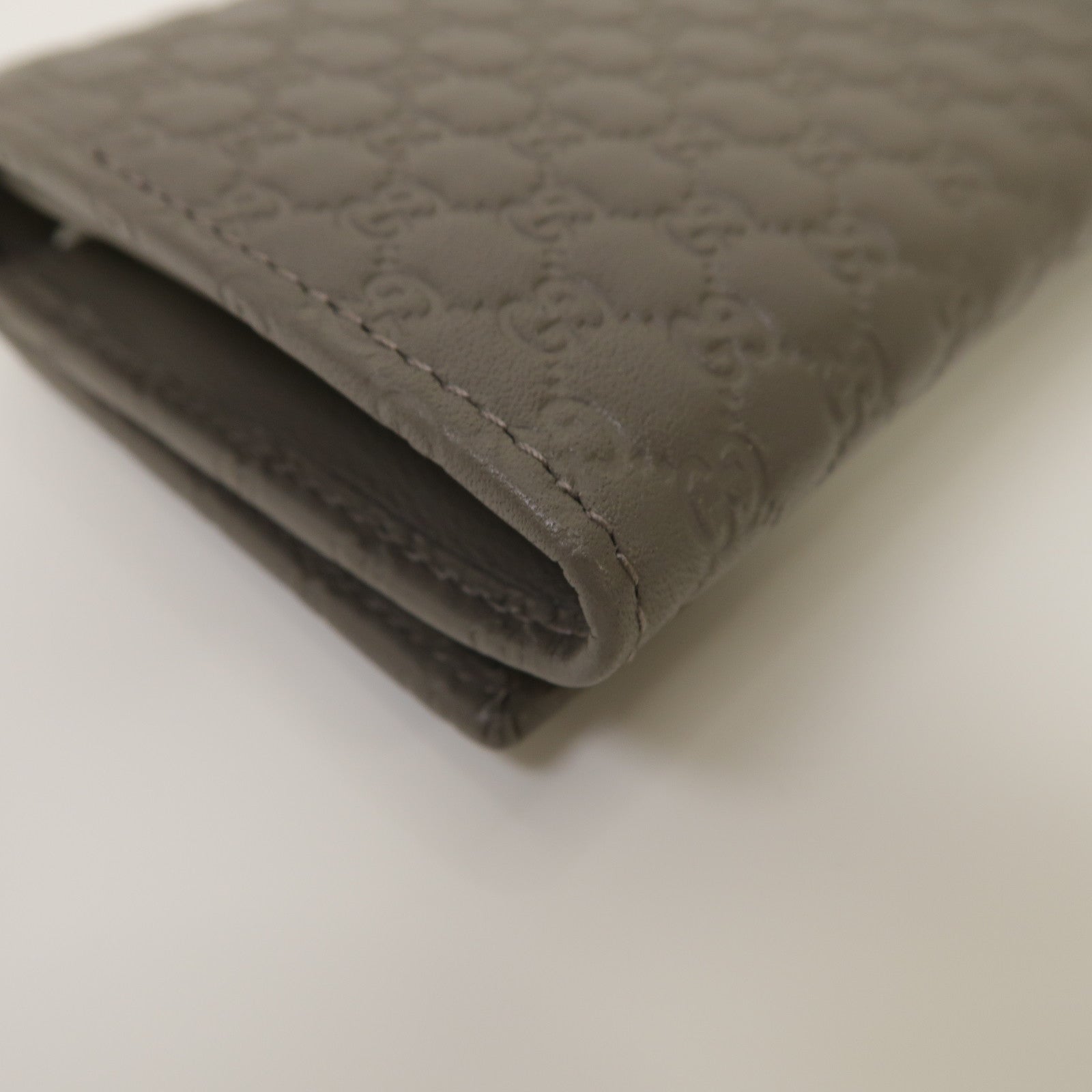 GUCCI 牛皮皮革Micro Guccissima Long Wallet金扣鈕扣長錢包灰色