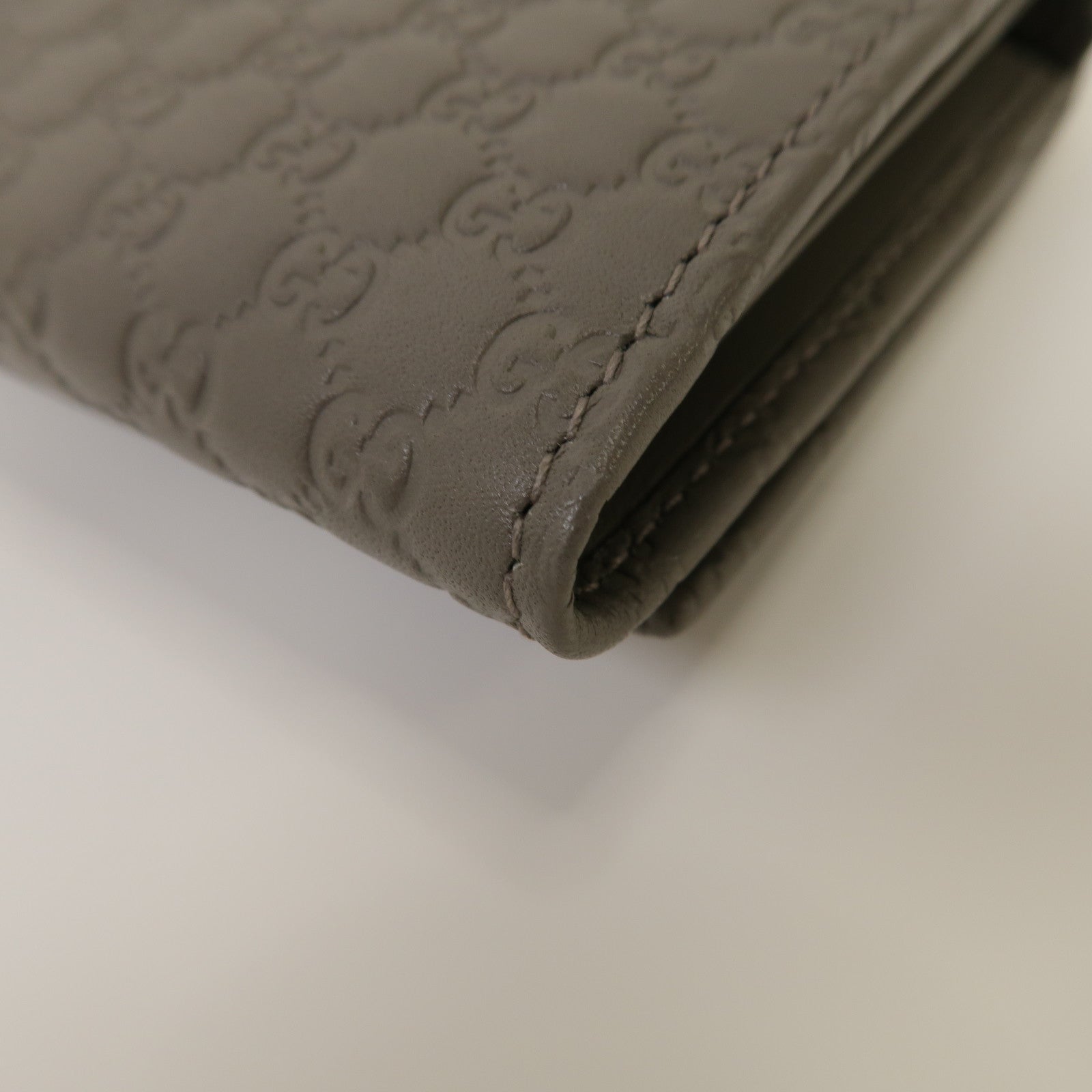 GUCCI 牛皮皮革Micro Guccissima Long Wallet金扣鈕扣長錢包灰色