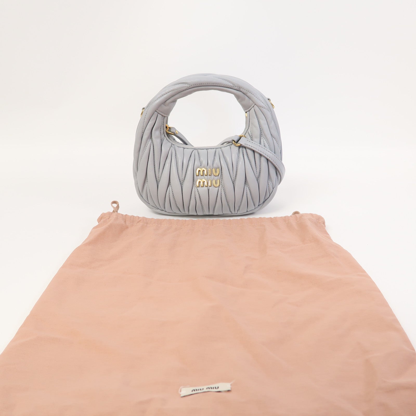 Miu Miu 羊皮皮革Wander Matelasse XS金扣手挽肩背兩用袋藍色