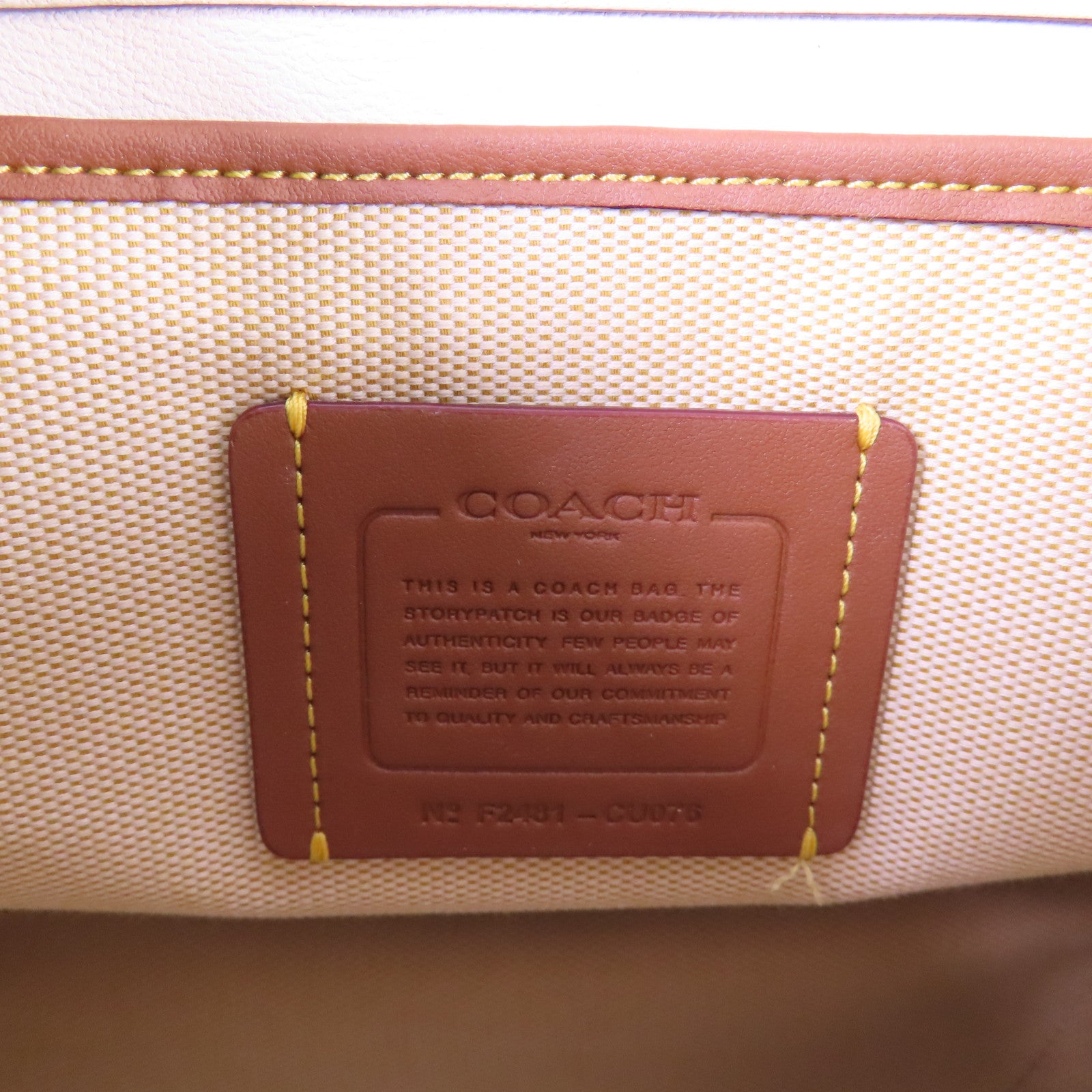 COACH 牛皮皮革Rucksack金扣背包