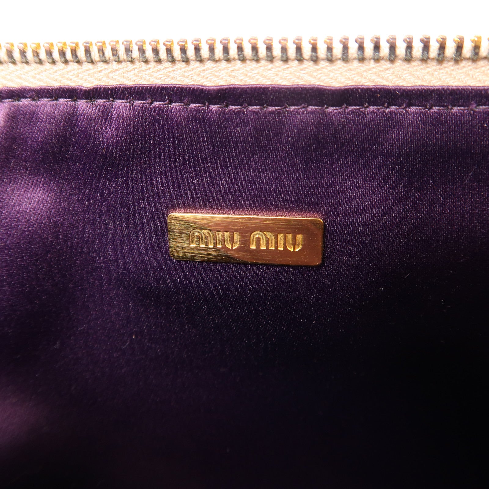 Miu Miu 牛皮皮革Hand Bag金扣手拿包