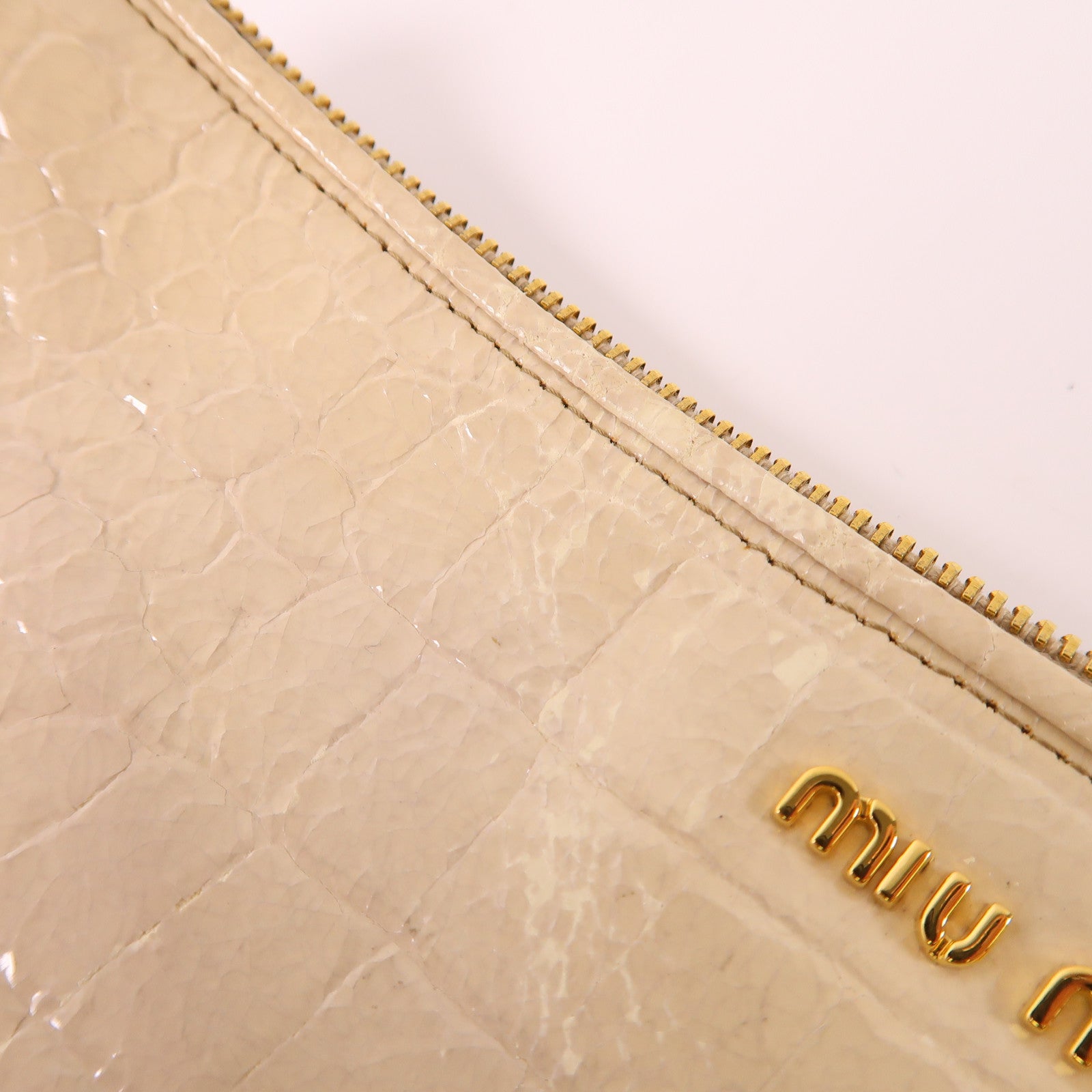 Miu Miu 牛皮皮革Hand Bag金扣手拿包