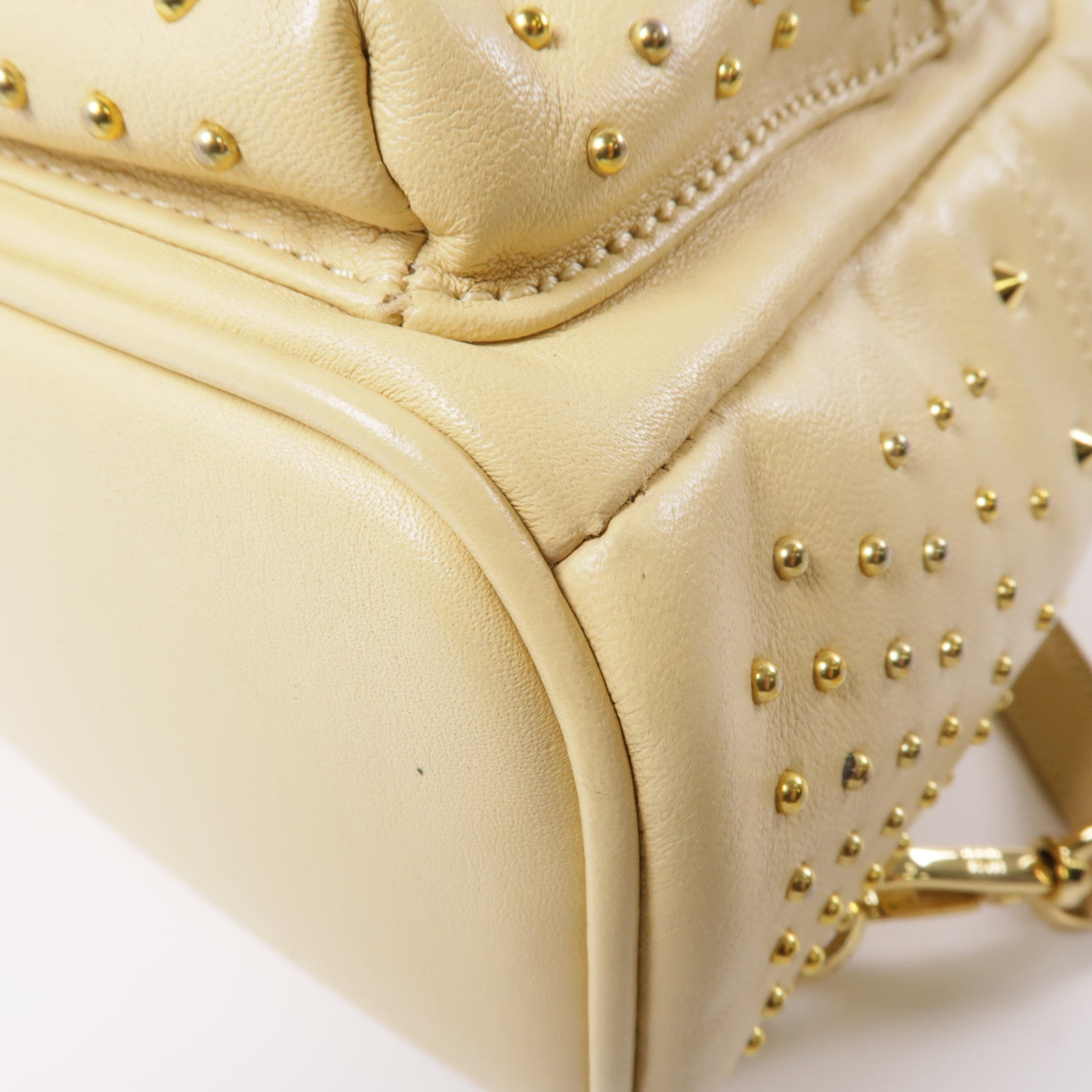 MCM 牛皮皮革Backpack金扣背包米色