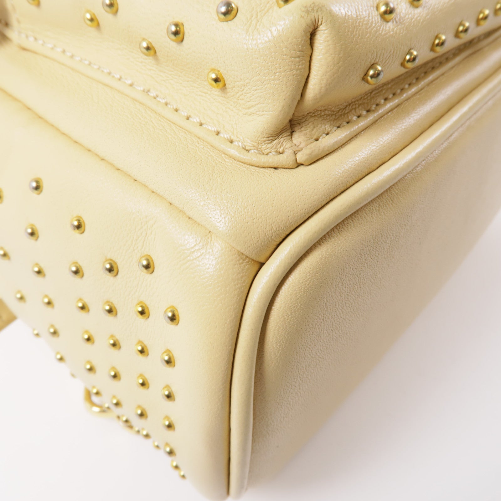 MCM 牛皮皮革Backpack金扣背包米色