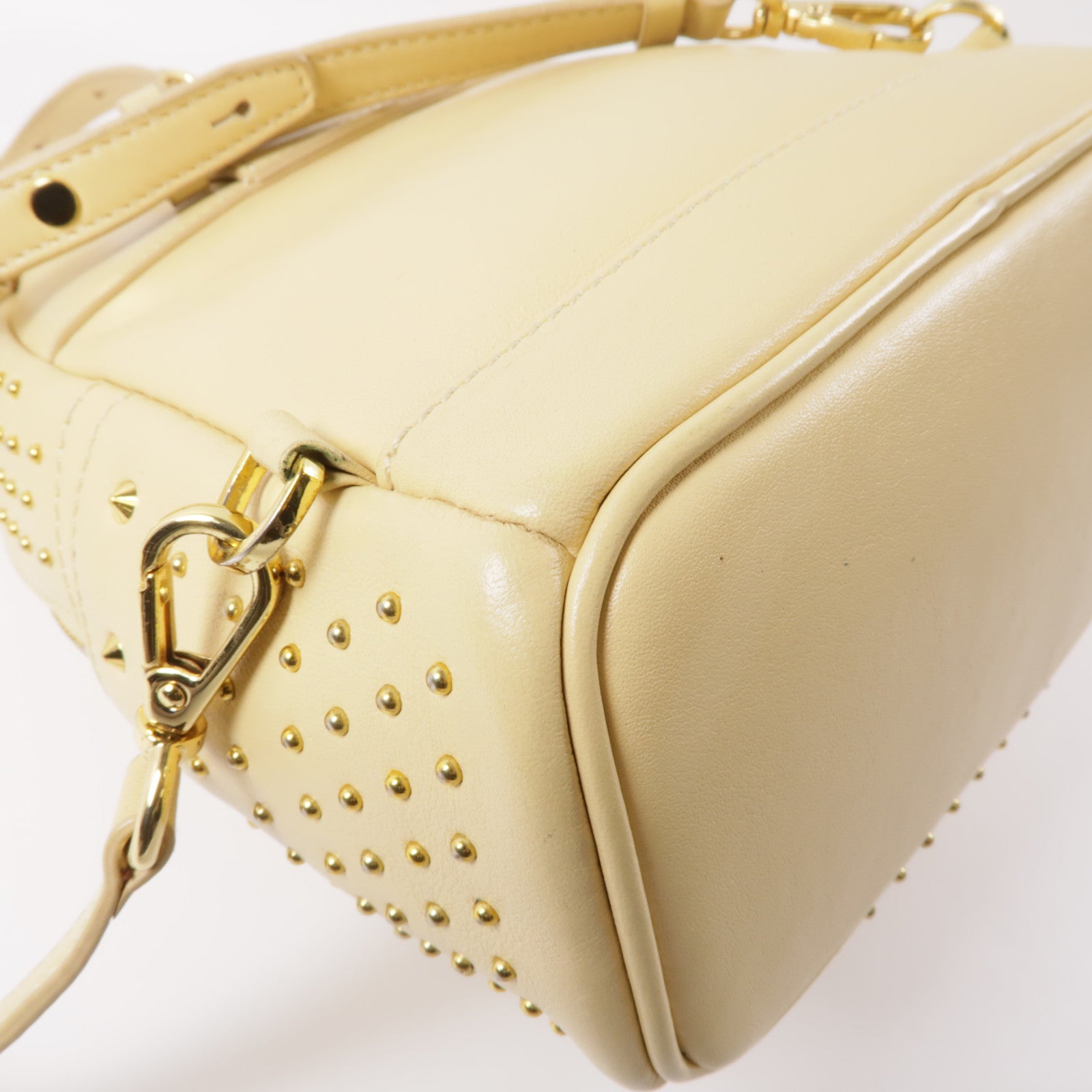 MCM 牛皮皮革Backpack金扣背包米色