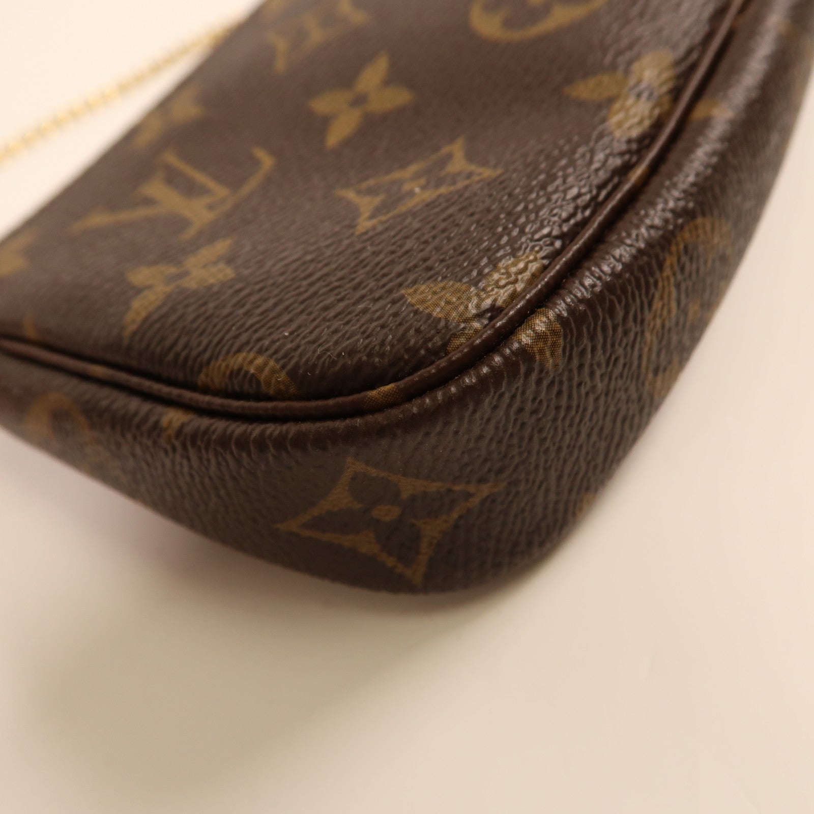 LOUIS VUITTON Monogram Mini Pochette Accessoires金扣手挽袋
