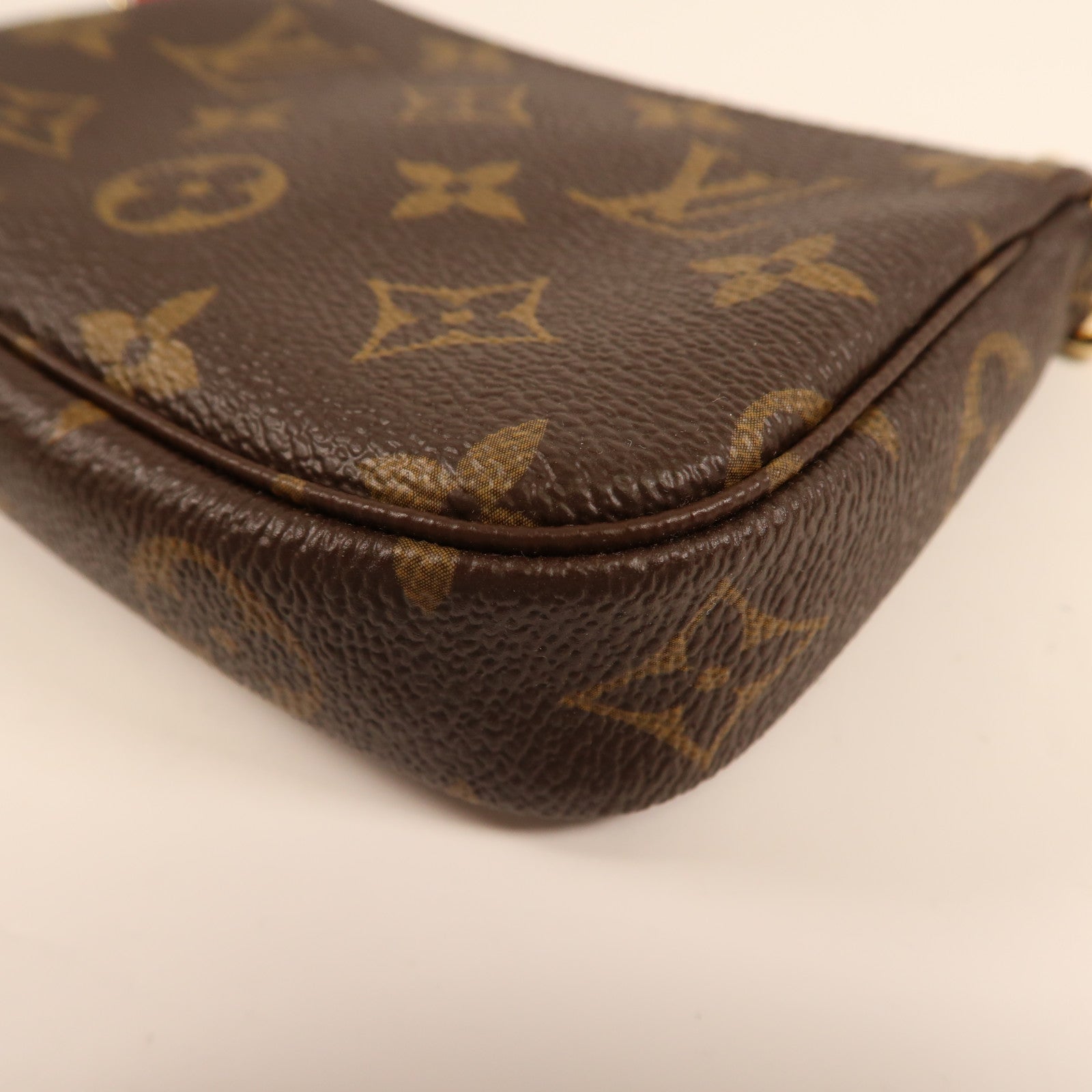 LOUIS VUITTON Monogram Mini Pochette Accessoires金扣手挽袋