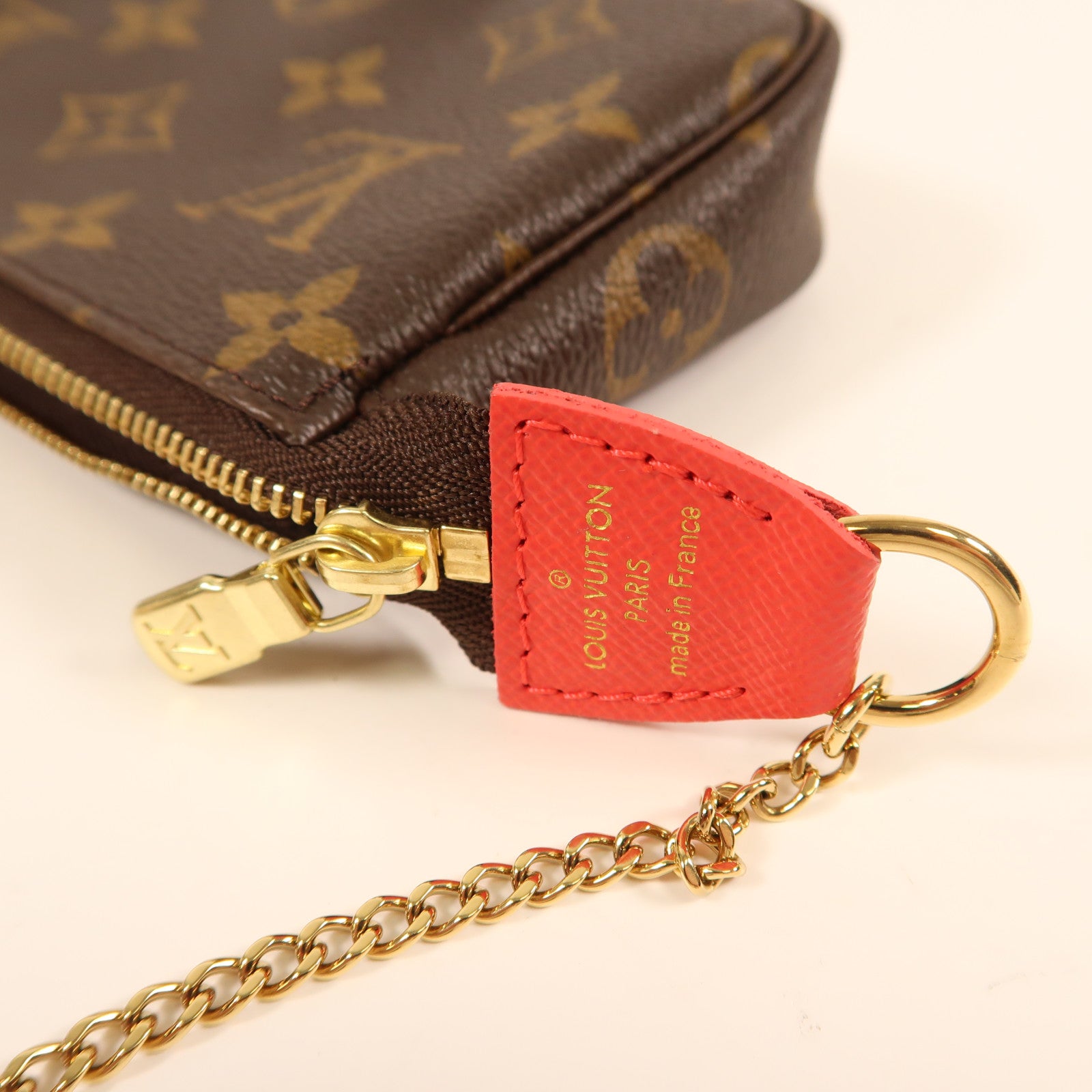 LOUIS VUITTON Monogram Mini Pochette Accessoires金扣手挽袋