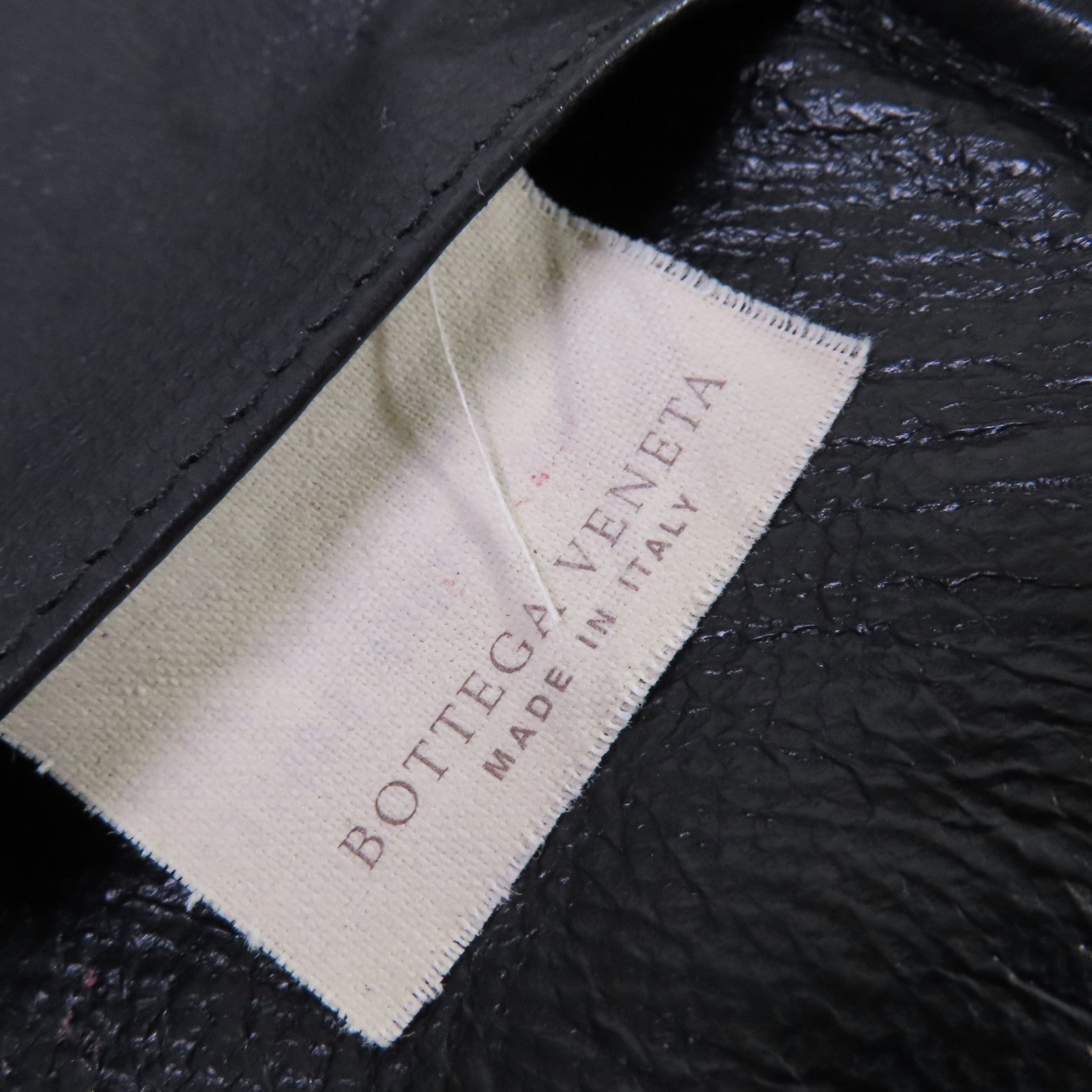 BOTTEGA VENETA 織紋皮革Pouch金扣手拿包黑色