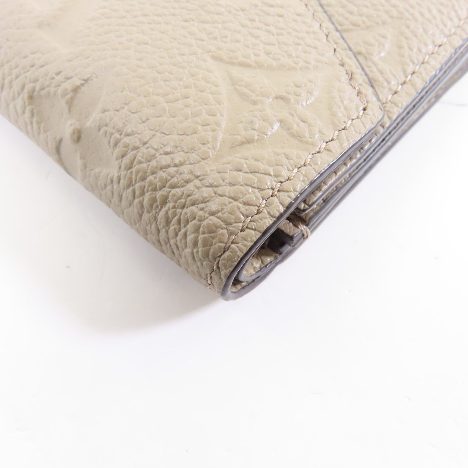 LOUIS VUITTON Monogram Empreinte Zoe Wallet金扣錢包米色