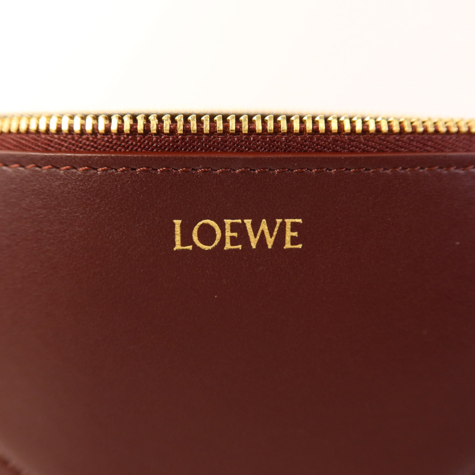 LOEWE 牛皮皮革Puzzle Fold Pouch金扣肩背袋
