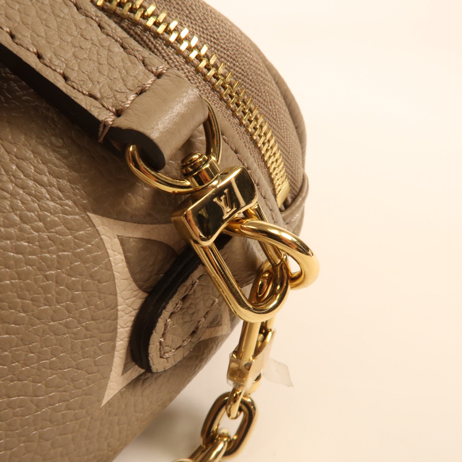LOUIS VUITTON Monogram Empreinte Mini Bumbag金扣手挽肩背兩用袋