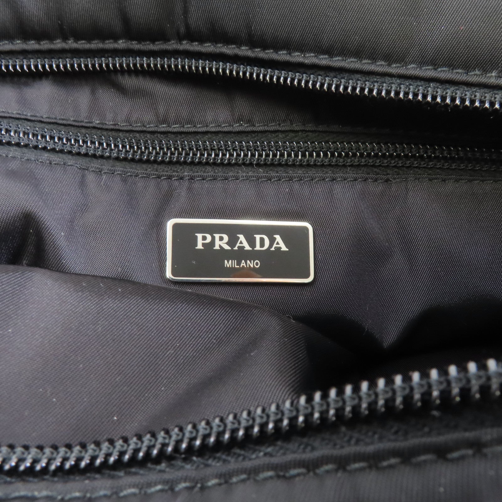 PRADA 尼龍Clutch銀扣手拿包黑色