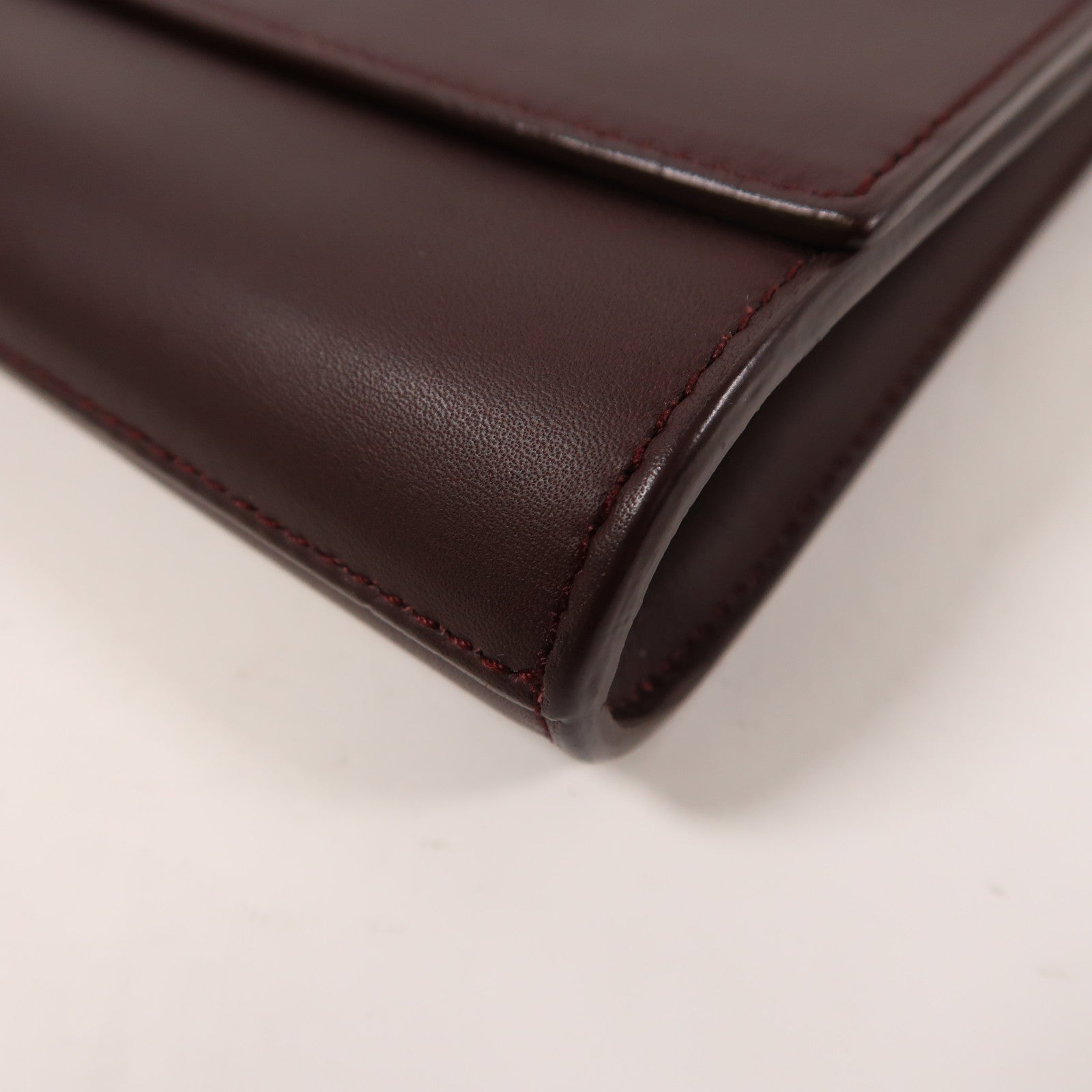SAINT LAURENT 牛皮皮革Pouch金扣手拿包