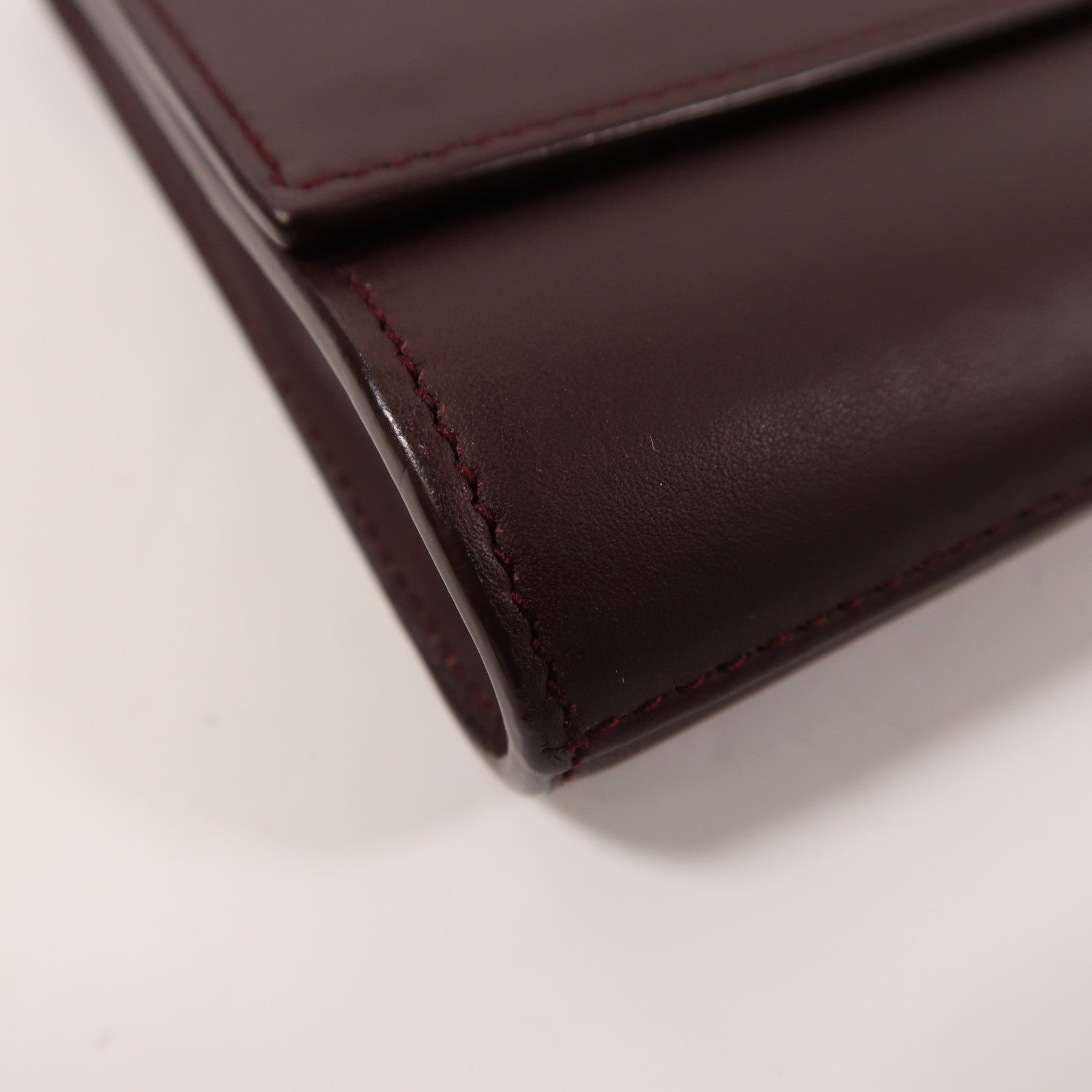 SAINT LAURENT 牛皮皮革Pouch金扣手拿包