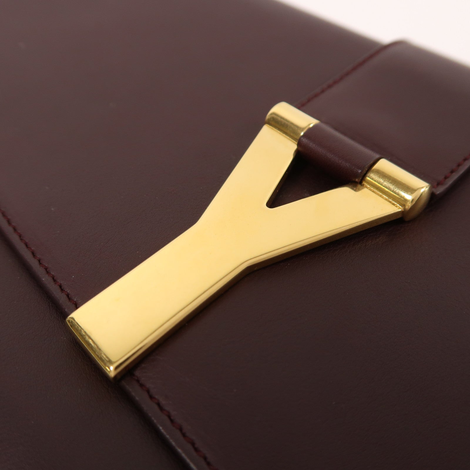 SAINT LAURENT 牛皮皮革Pouch金扣手拿包