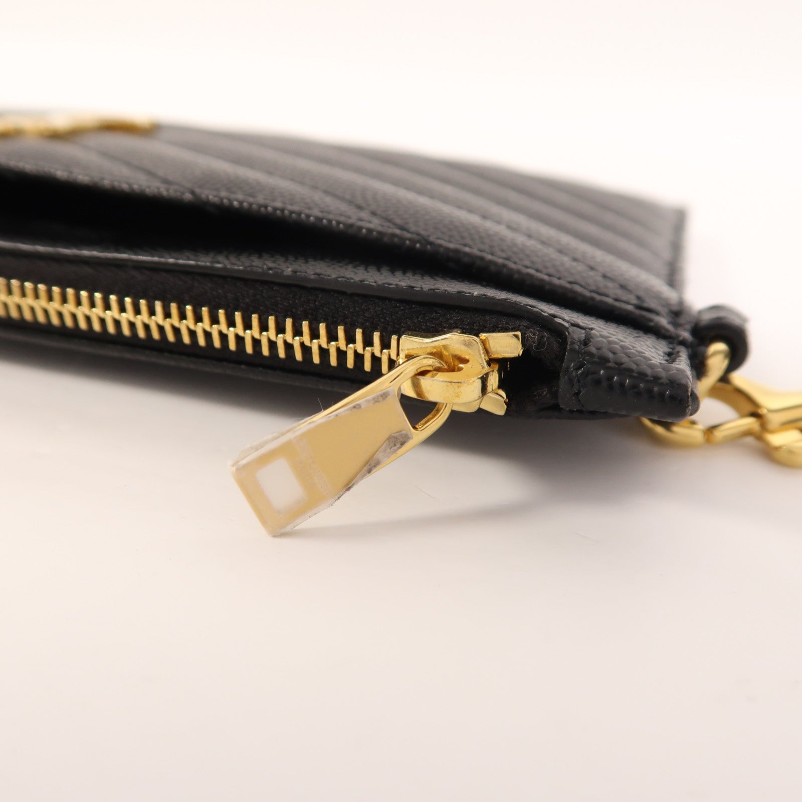 SAINT LAURENT 牛皮皮革Cassandre Matelasse Large Pouch金扣手拿包