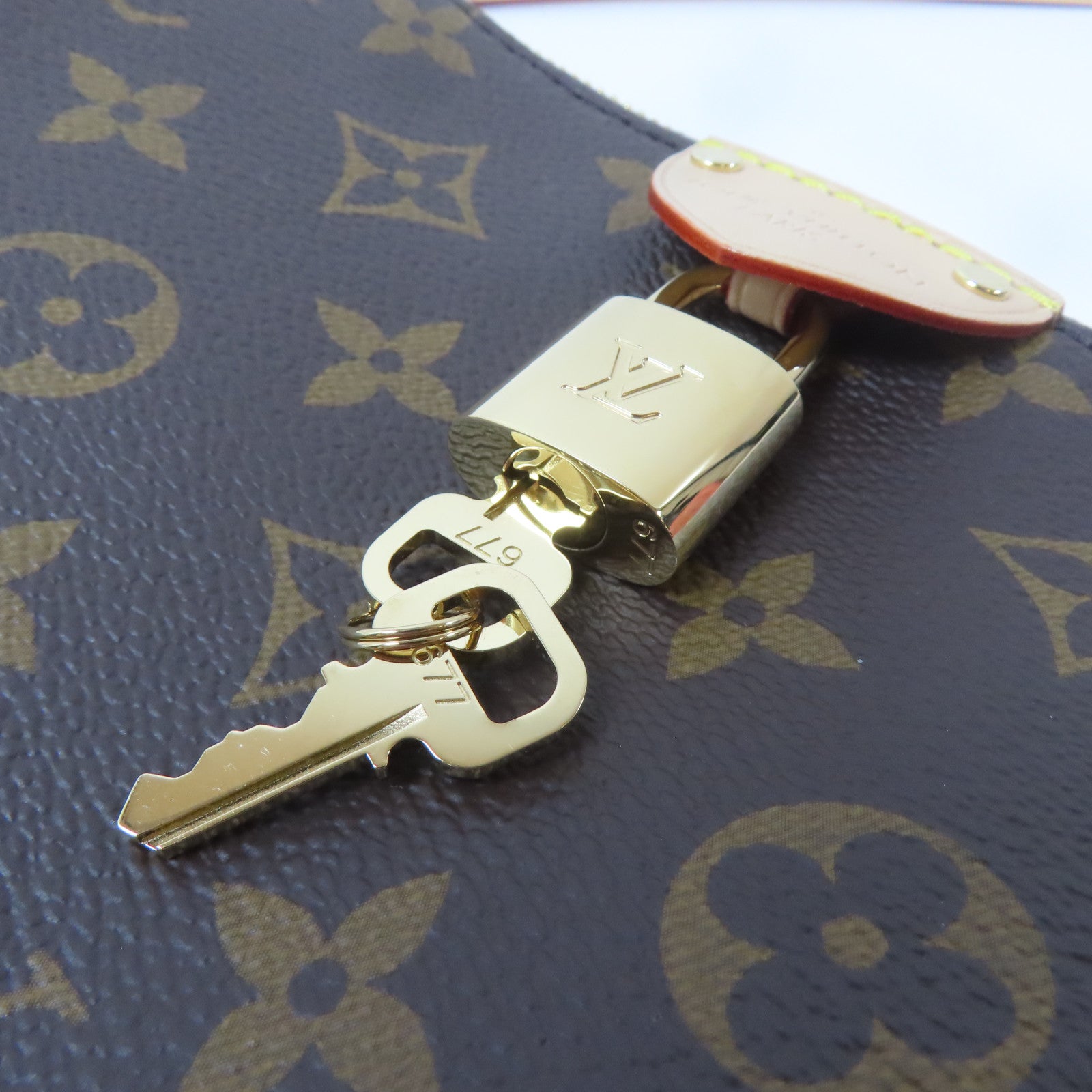 LOUIS VUITTON Monogram Pochette Tirette金扣手挽肩背兩用袋啡色