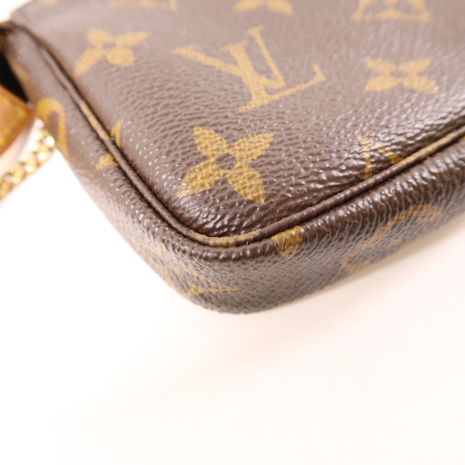 LOUIS VUITTON Monogram Mini Pochette Accessoires金扣手挽袋棕色
