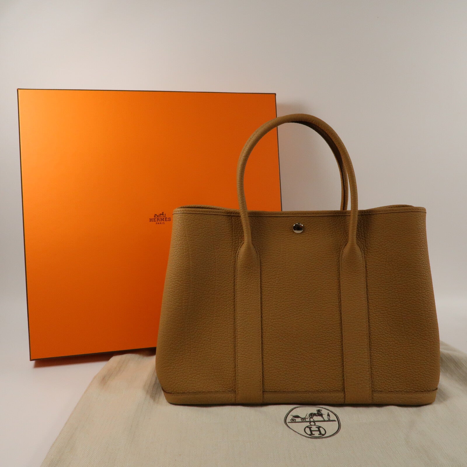 HERMES Clemence皮革GardenParty PM銀扣手挽袋Biscuit