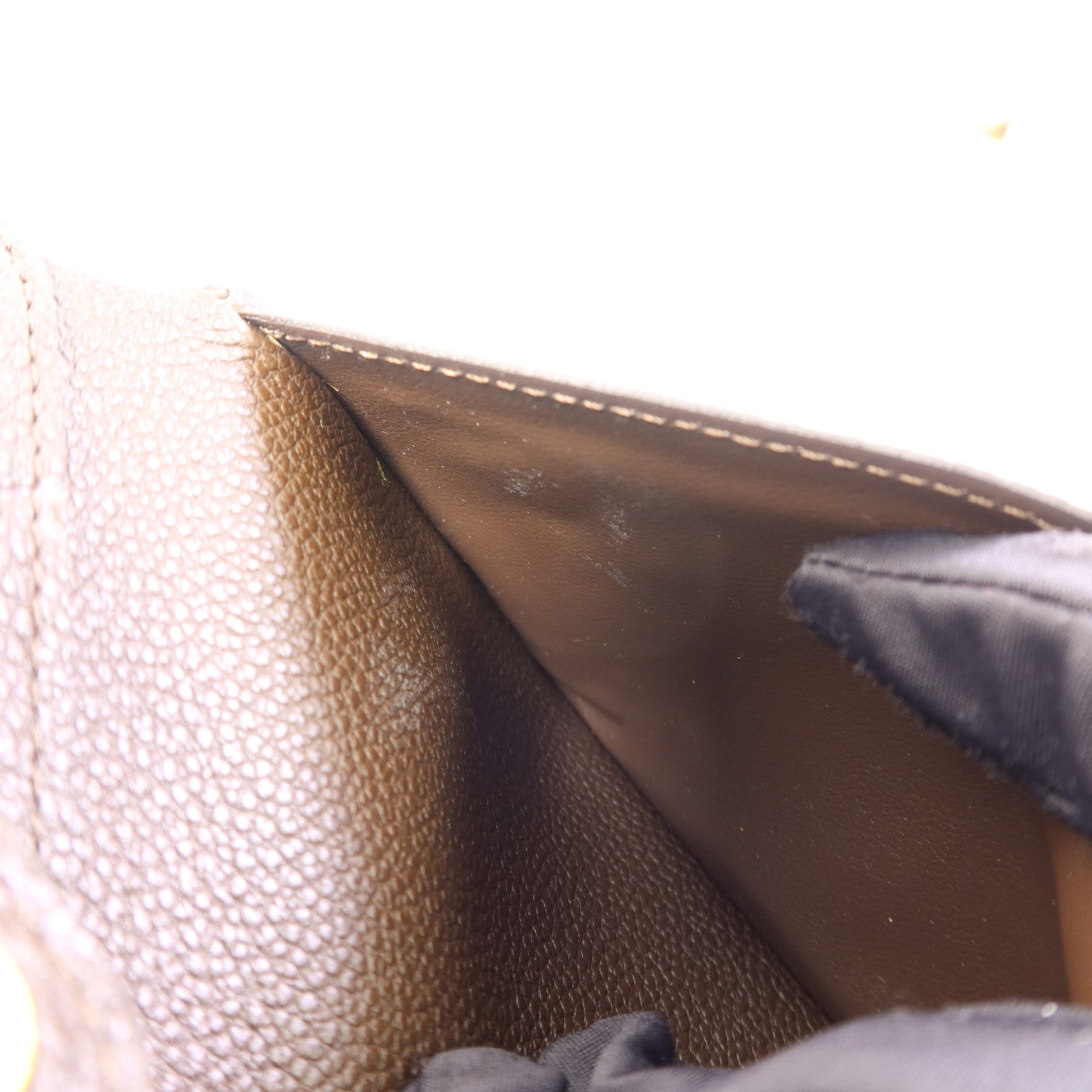 LOUIS VUITTON Monogram Empreinte Compact Curieuse Trifold Wallet金扣錢包